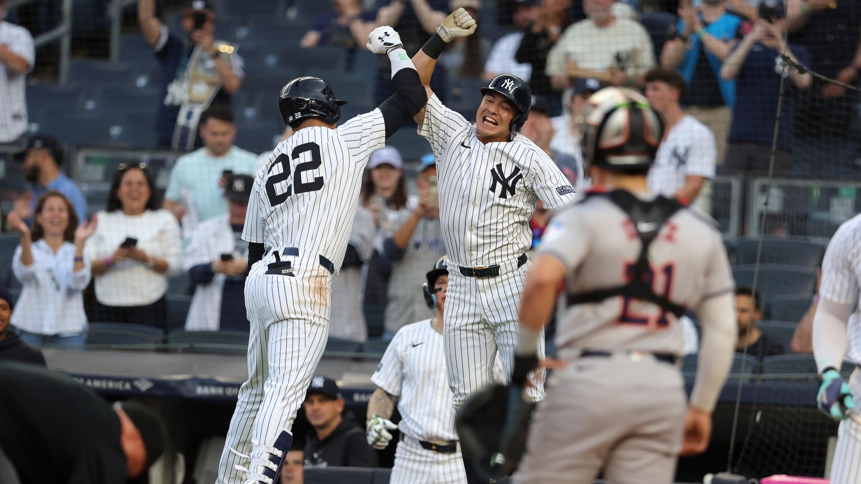 May 8, 2024; Bronx, New York, USA; New York Yankees right fielder Juan Soto (22) celebrates with shortstop Anthony Volpe (11) after hitting a two run home run against the Houston Astros during the first inning at Yankee Stadium. / Brad Penner-USA TODAY Sports