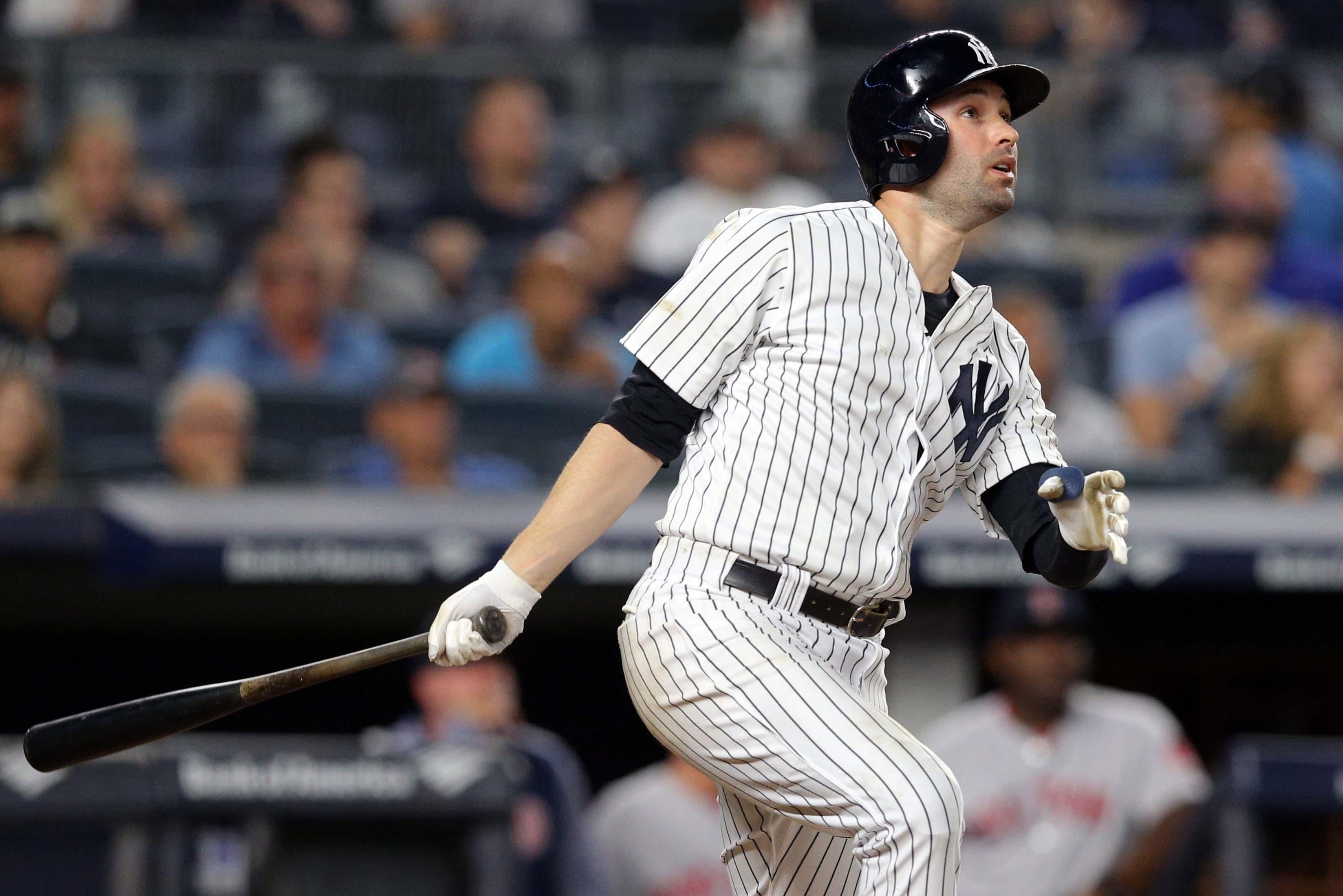 Sep 18, 2018; Bronx, NY, USA; New York Yankees first baseman Neil Walker (14) hits a three run home run against the Boston Red Sox during the seventh inning at Yankee Stadium. Mandatory Credit: Brad Penner-USA TODAY Sports