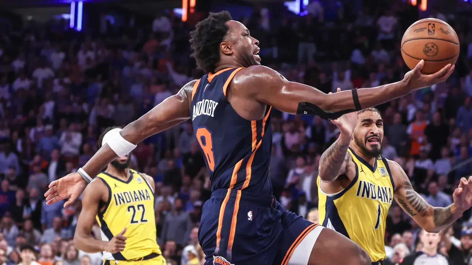 New York Knicks forward OG Anunoby (8) drives past Indiana Pacers forward Obi Toppin (1) in the third quarter during game two of the second round for the 2024 NBA playoffs at Madison Square Garden. / Wendell Cruz-USA TODAY Sports