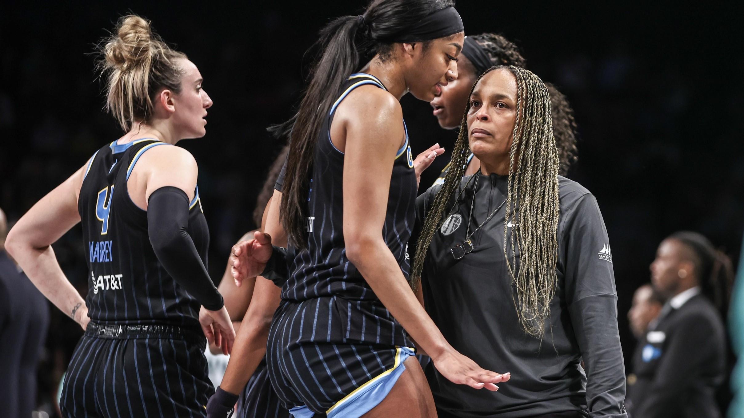 May 23, 2024; Brooklyn, New York, USA; Chicago Sky forward Angel Reese (5) talks with head coach Teresa Weatherspoon during a time out in the fourth quarter against the New York Liberty at Barclays Center. / Wendell Cruz-USA TODAY Sports