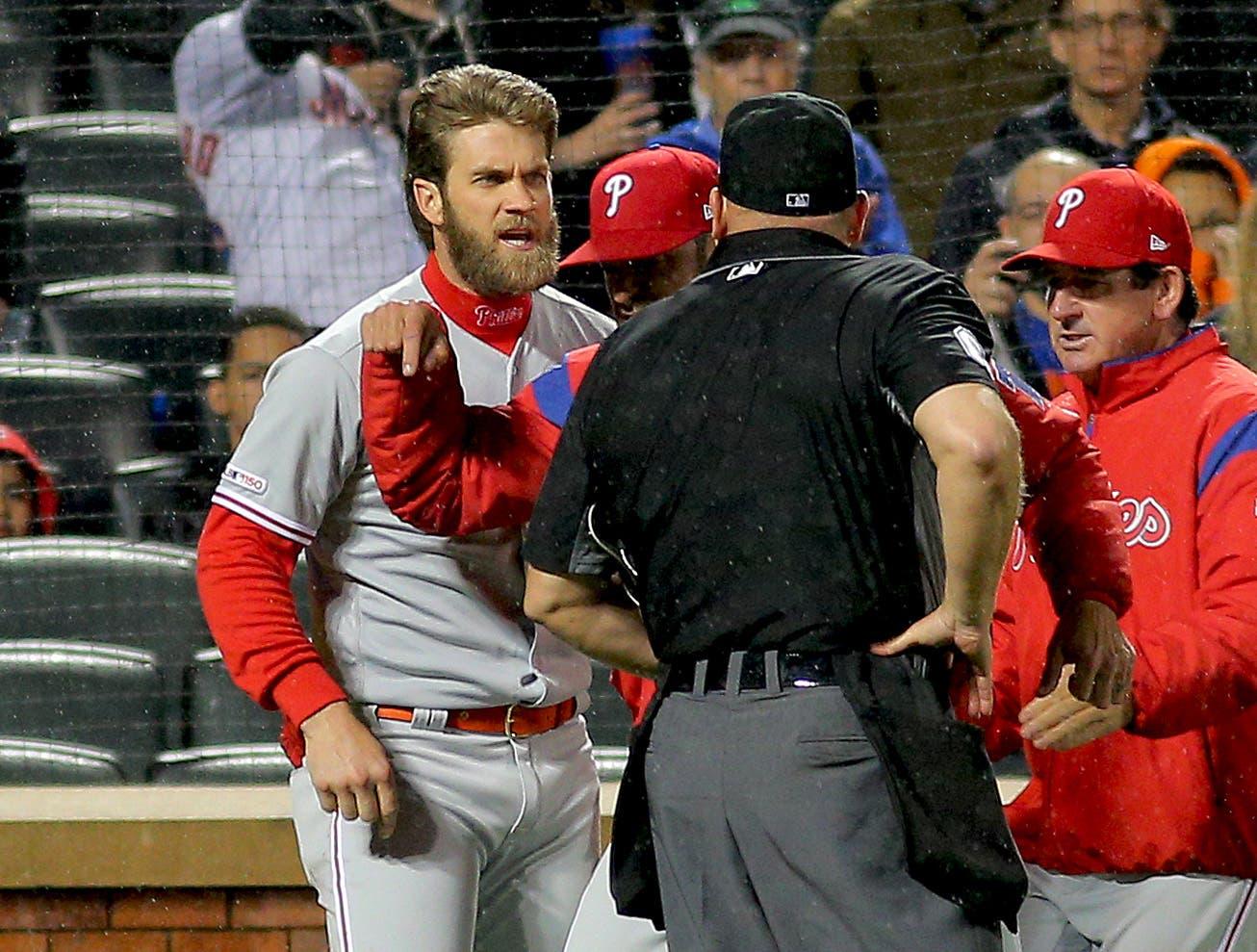 Apr 22, 2019; New York City, NY, USA; Philadelphia Phillies right fielder Bryce Harper (3) argues a strike call and is ejected by home plate umpire Mark Carlson against the New York Mets during the fourth inning at Citi Field. Mandatory Credit: Andy Marlin-USA TODAY Sports / Andy Marlin