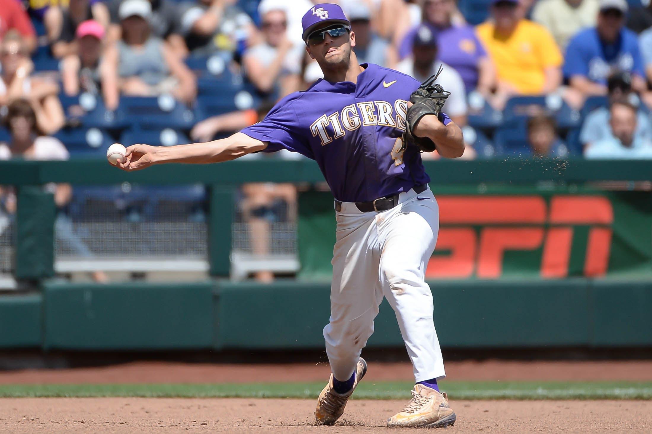 LSU Tigers infielder Josh Smith throws to first base in the third inning against the Oregon State Beavers at TD Ameritrade Park Omaha. / Steven Branscombe/USA TODAY Sports