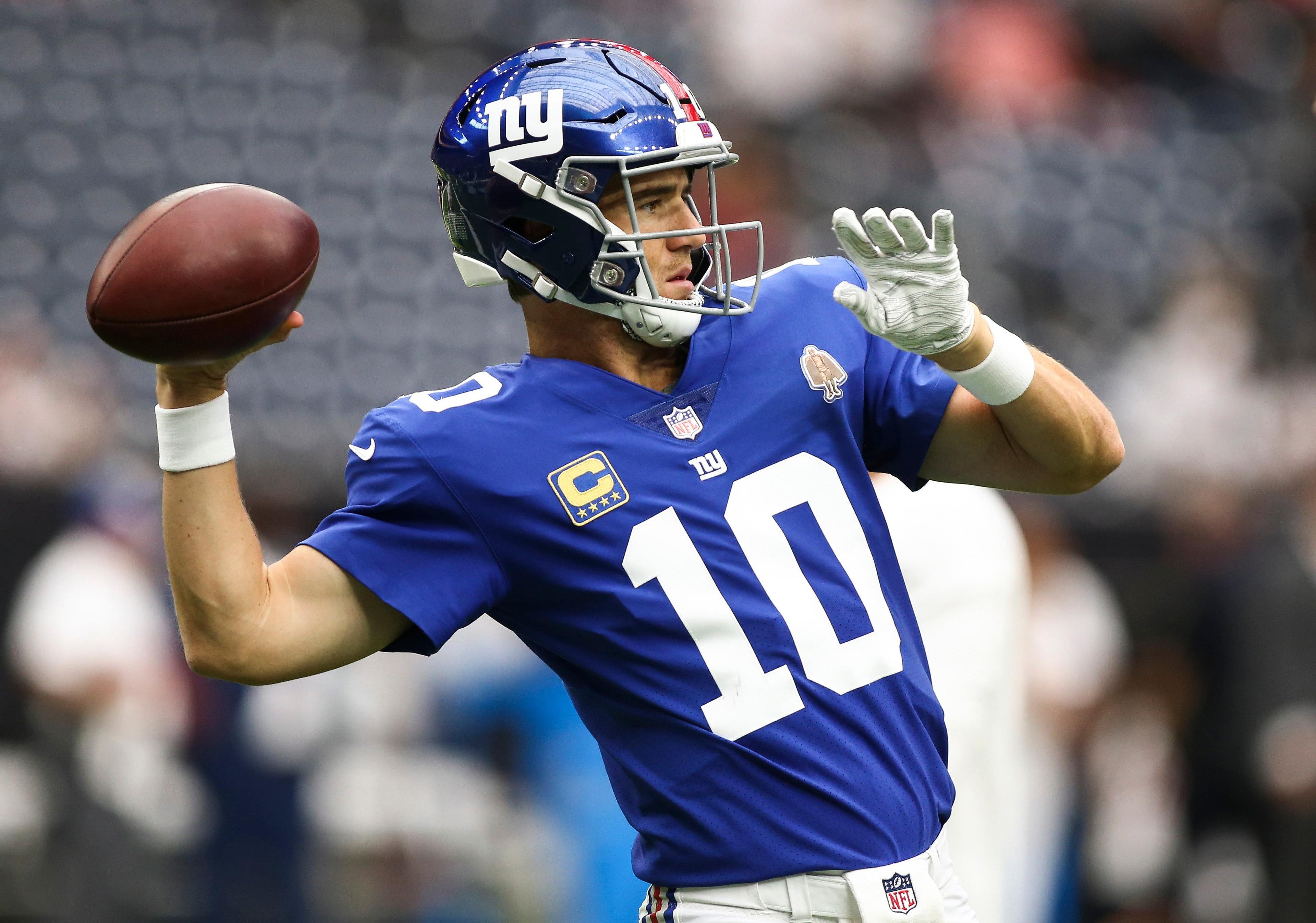 New York Giants quarterback Eli Manning warms up before a game against the Houston Texans at NRG Stadium. / Troy Taormina/USA TODAY Sports