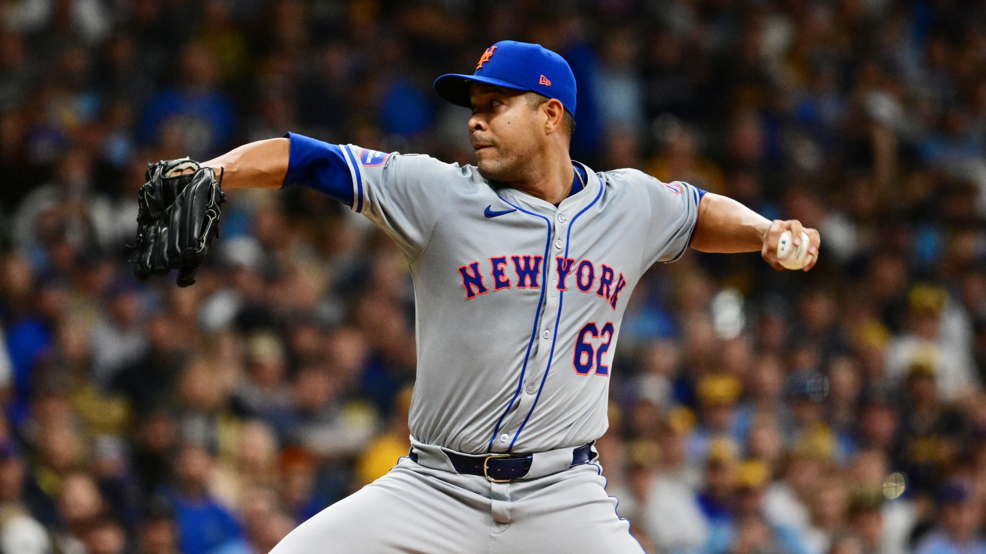 Oct 3, 2024; Milwaukee, Wisconsin, USA; New York Mets pitcher Jose Quintana (62) pitches against the Milwaukee Brewers in the first inning during game three of the Wildcard round for the 2024 MLB Playoffs at American Family Field. Mandatory Credit: Benny Sieu-Imagn Images