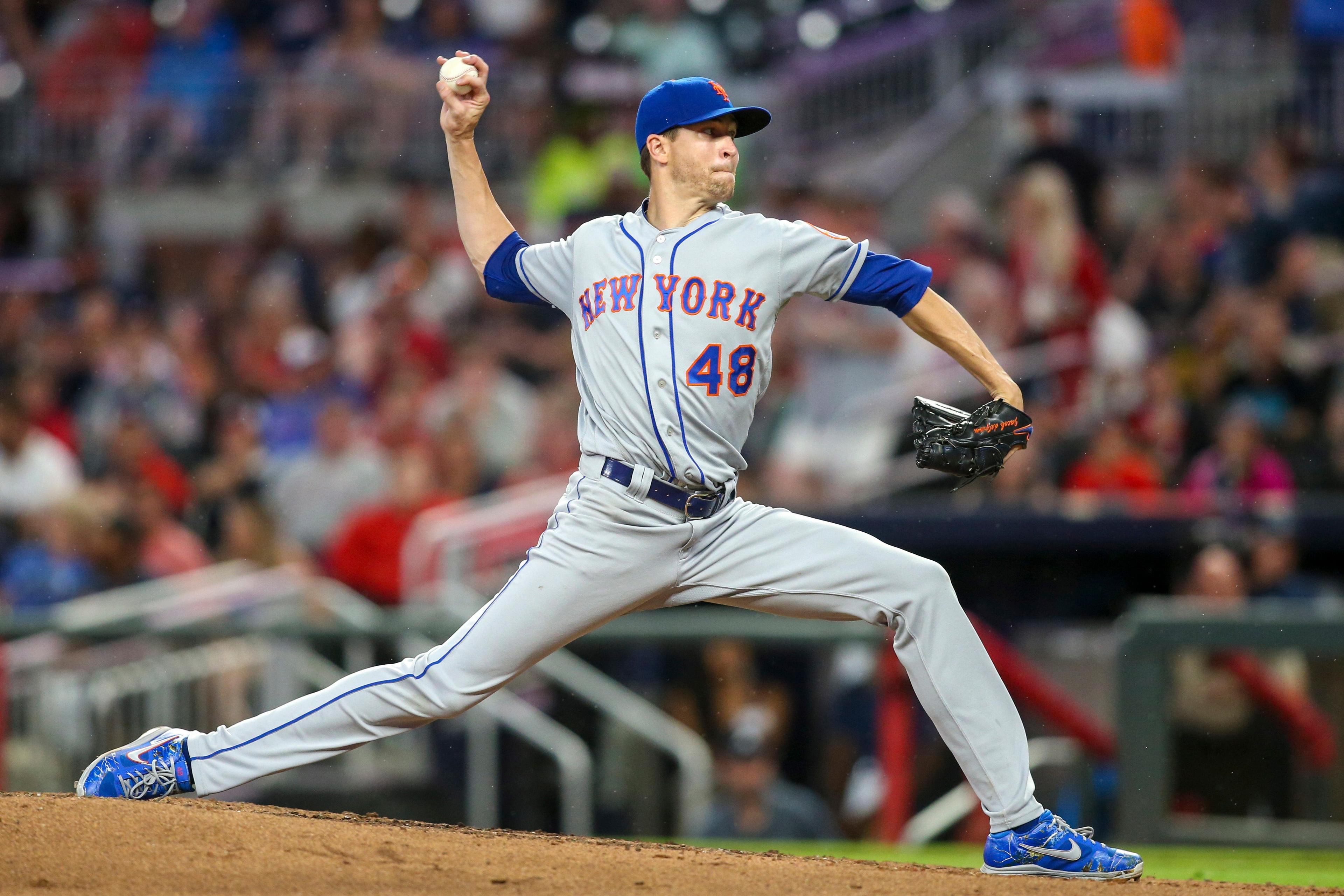 Jun 18, 2019; Atlanta, GA, USA; New York Mets starting pitcher Jacob deGrom (48) throws against the Atlanta Braves in the fifth inning at SunTrust Park. Mandatory Credit: Brett Davis-USA TODAY Sports
