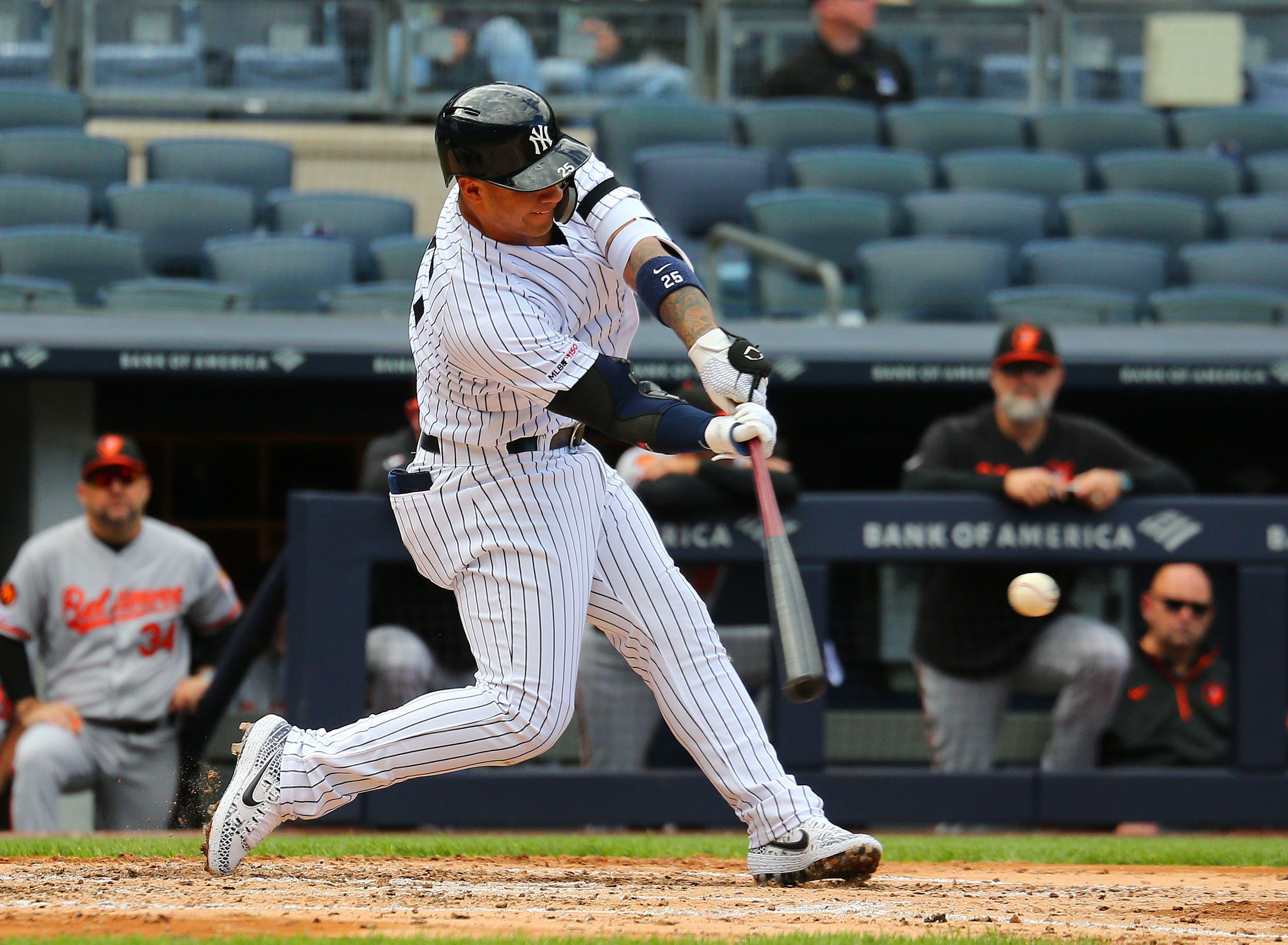 May 15, 2019; New York, NY, USA; New York Yankees shortstop Gleyber Torres (25) hits a solo home run against the Baltimore Orioles during the fourth inning of game one of a doubleheader at Yankees Stadium. Mandatory Credit: Andy Marlin-USA TODAY Sports / Andy Marlin