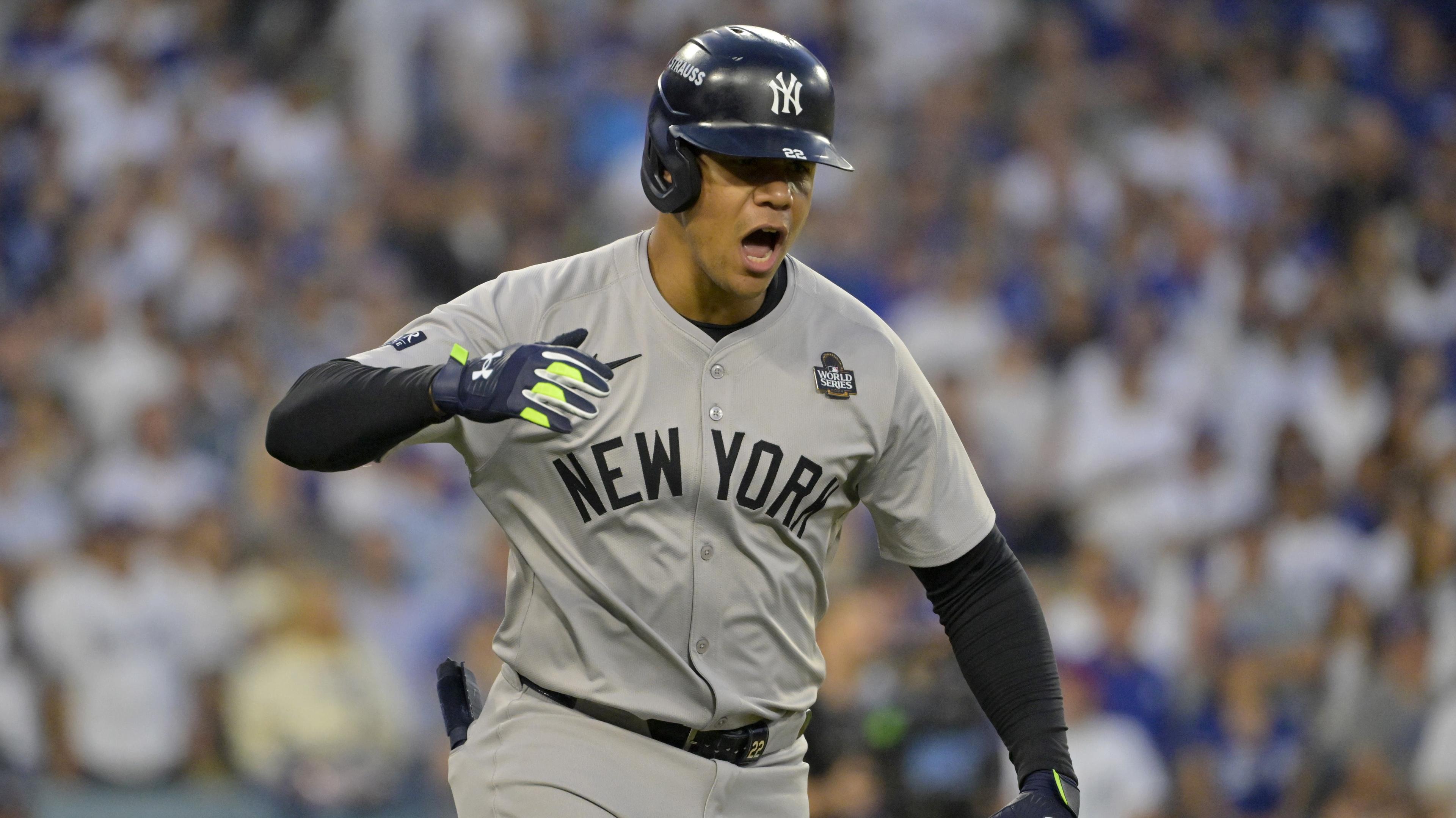 Oct 26, 2024; Los Angeles, California, USA; New York Yankees outfielder Juan Soto (22) celebrates after hitting a solo home run in the third inning against the Los Angeles Dodgers during game two of the 2024 MLB World Series at Dodger Stadium. 