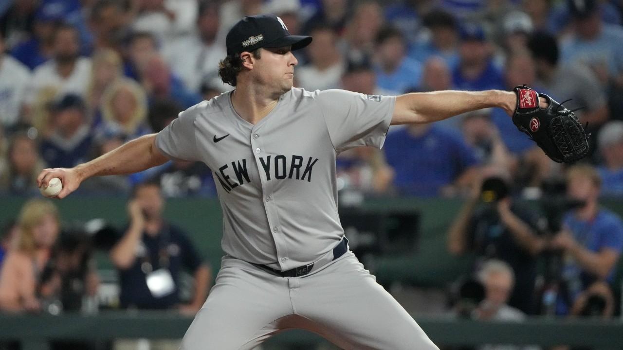 New York Yankees pitcher Gerrit Cole (45) throws a pitch during the first inning against the Kansas City Royals during game four of the ALDS for the 2024 MLB Playoffs at Kauffman Stadium.