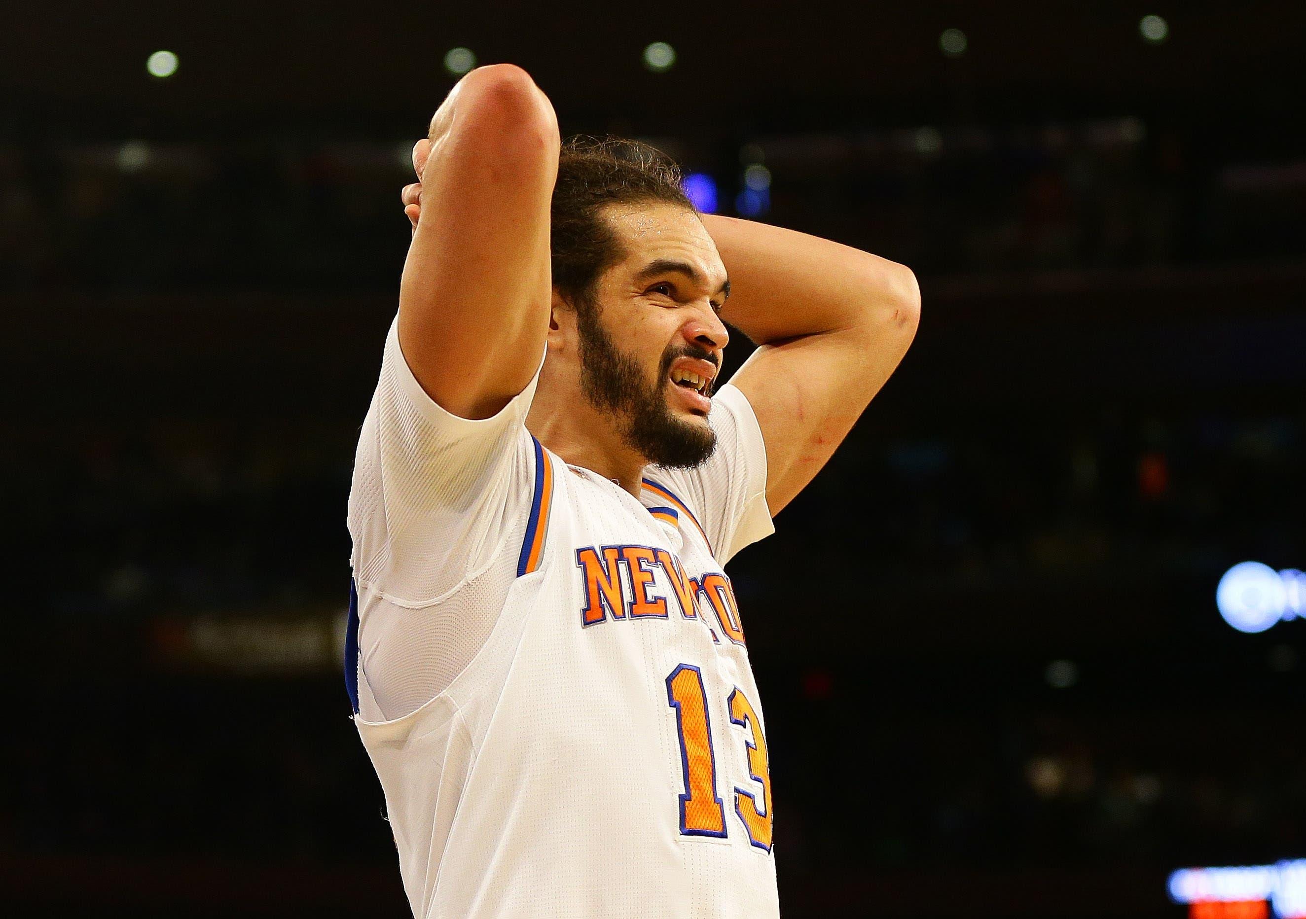 Jan 16, 2017; New York, NY, USA; New York Knicks center Joakim Noah (13) reacts after the Atlanta Hawks defeated the New York Knicks at Madison Square Garden. The Hawks won 108-107. Mandatory Credit: Andy Marlin-USA TODAY Sports / Andy Marlin