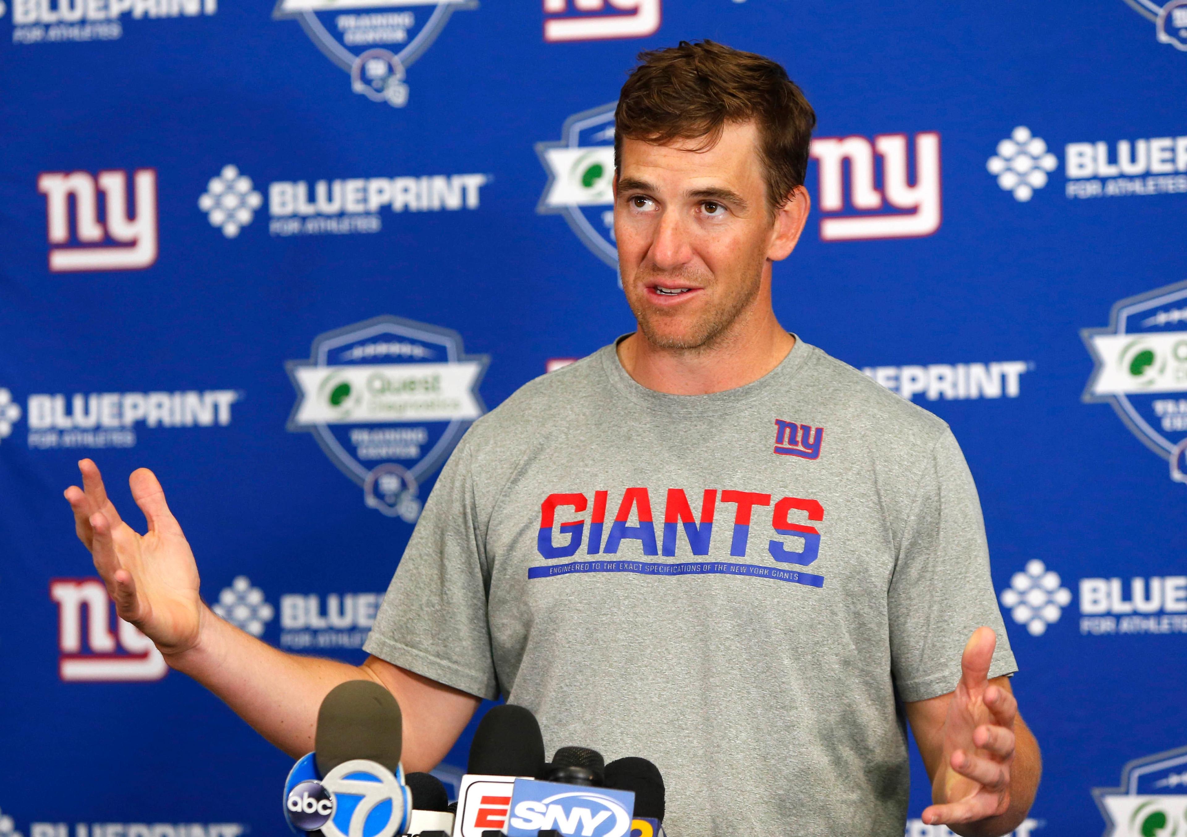 May 20, 2019; East Rutherford, NJ, USA; New York Giants quarterback Eli Manning answers questions from media during organized team activities at Quest Diagnostic Training Center. Mandatory Credit: Noah K. Murray-USA TODAY Sports / Noah K. Murray