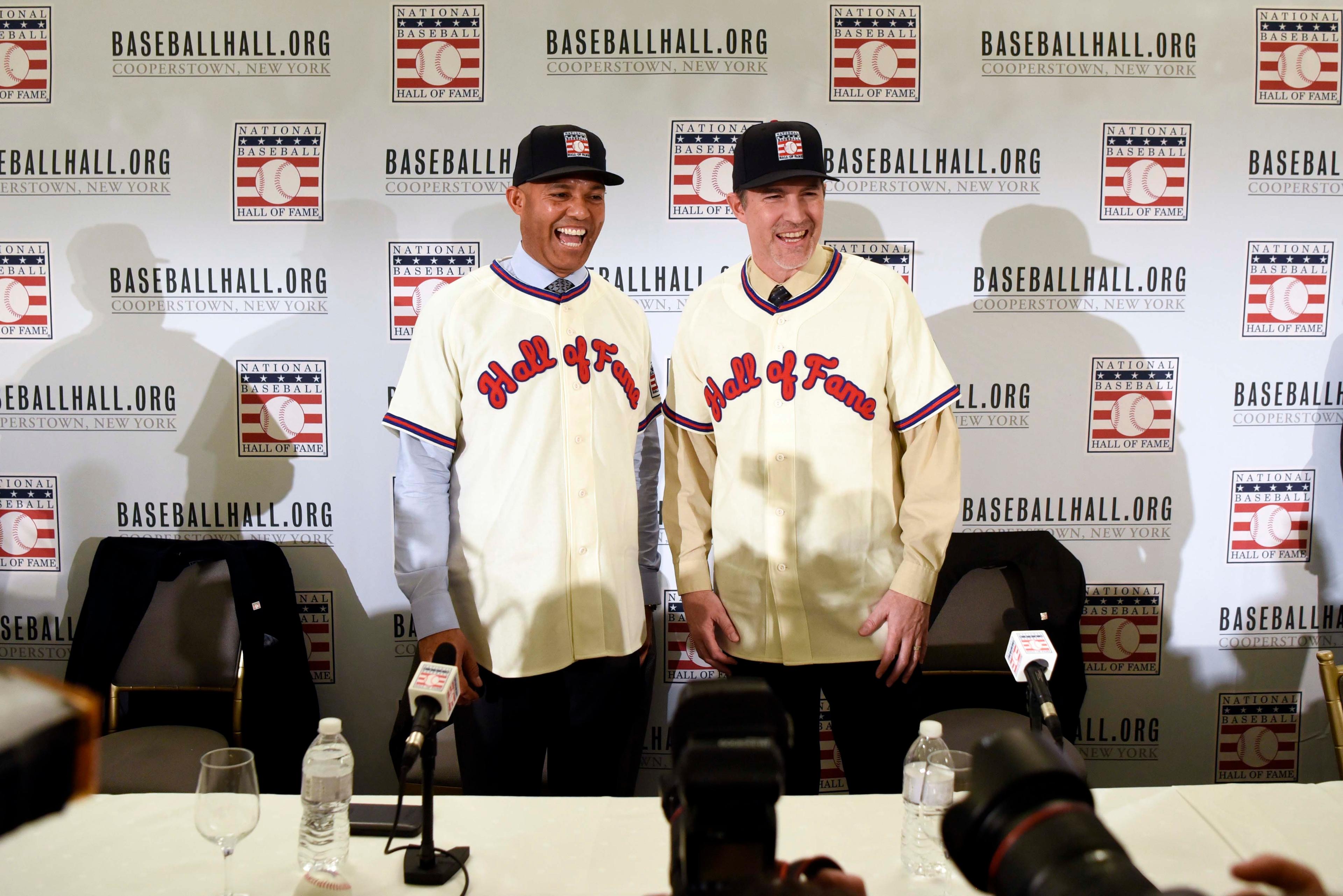 Jan 23, 2019; New York, NY, USA; New York Yankees former pitchers Mike Mussina (left) and Mariano Rivera (right) pose for a photo at a press conference after being elected into the Hall of Fame. Mandatory Credit: Danielle Parhizkaran/NorthJersey.com via USA TODAY NETWORK