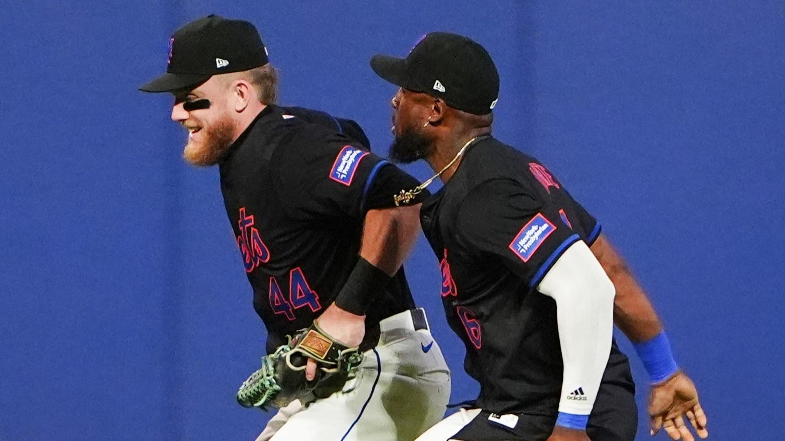 May 31, 2024; New York City, New York, USA; New York Mets left fielder Brandon Nimmo (9) and center fielder Harrison Bader (44) and right fielder Starling Marte (6) celebrate the victory after the ninth inning against the Arizona Diamondbacks at Citi Field. Mandatory Credit: Gregory Fisher-USA TODAY Sports