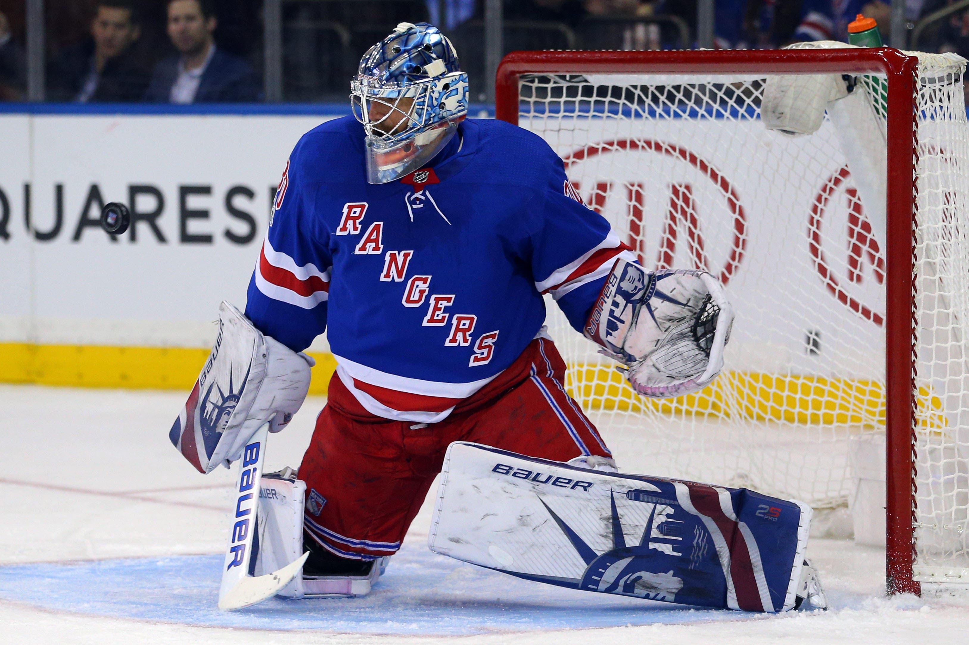 New York Rangers goalie Henrik Lundqvist makes a save against the Columbus Blue Jackets during the first period at Madison Square Garden. / Brad Penner/USA TODAY Sports