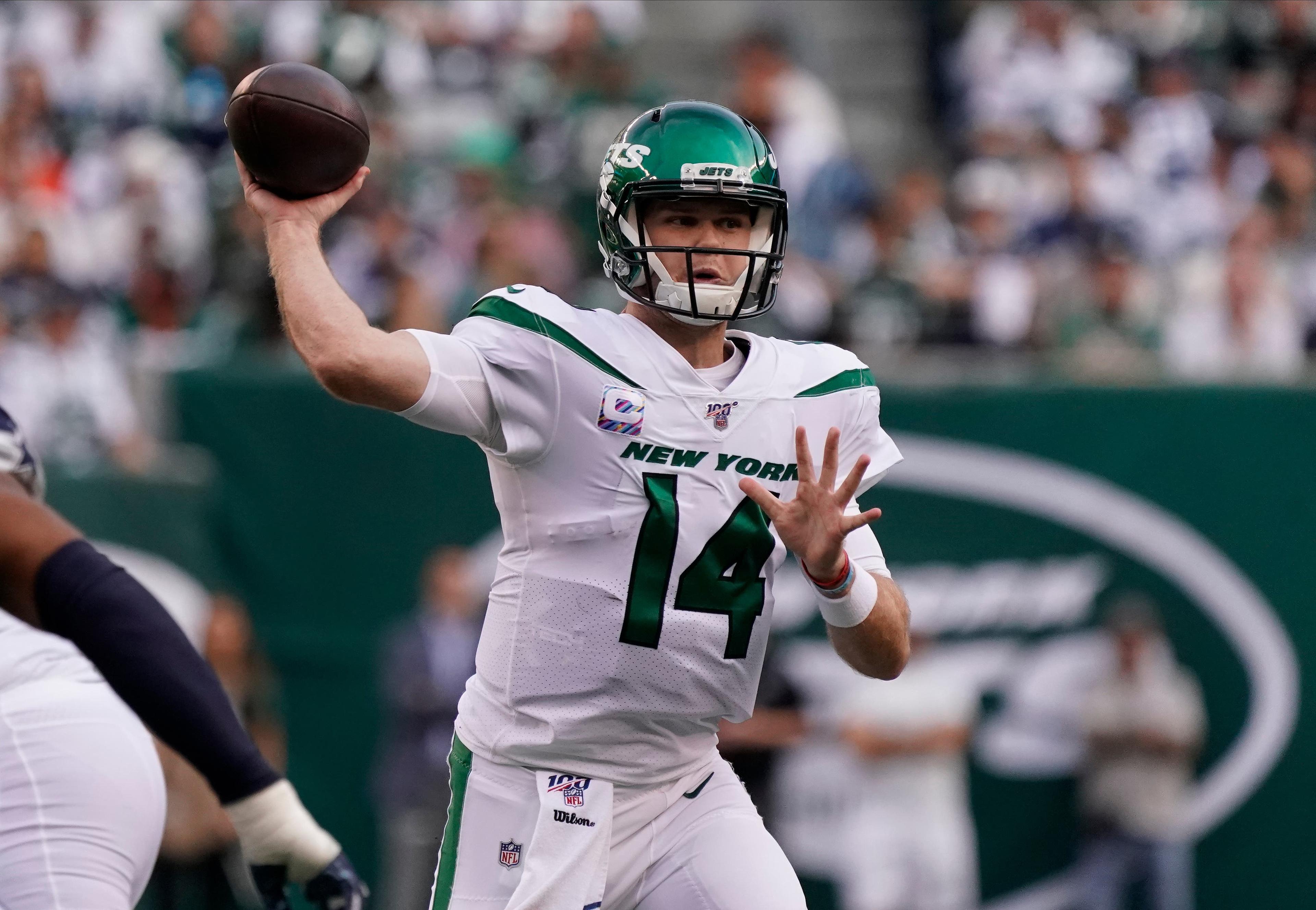 Oct 13, 2019; East Rutherford, NJ, USA; New York Jets quarterback Sam Darnold (14) throws against the Dallas Cowboys in the first quarter at MetLife Stadium. Mandatory Credit: Robert Deutsch-USA TODAY Sports / Robert Deutsch