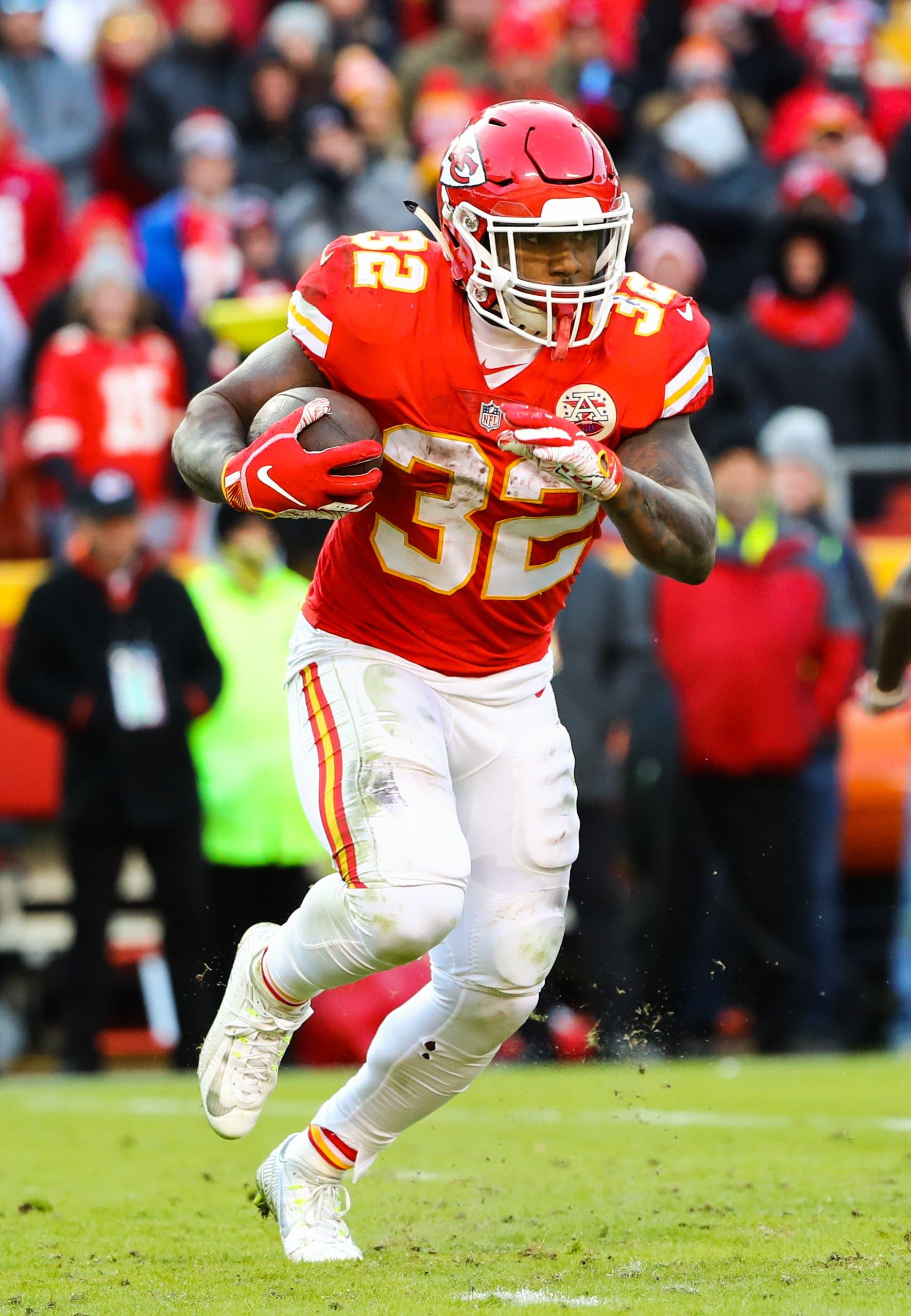 Dec 9, 2018; Kansas City, MO, USA; Kansas City Chiefs running back Spencer Ware (32) runs against the Baltimore Ravens at Arrowhead Stadium. Mandatory Credit: Jay Biggerstaff-USA TODAY Sports / Jay Biggerstaff