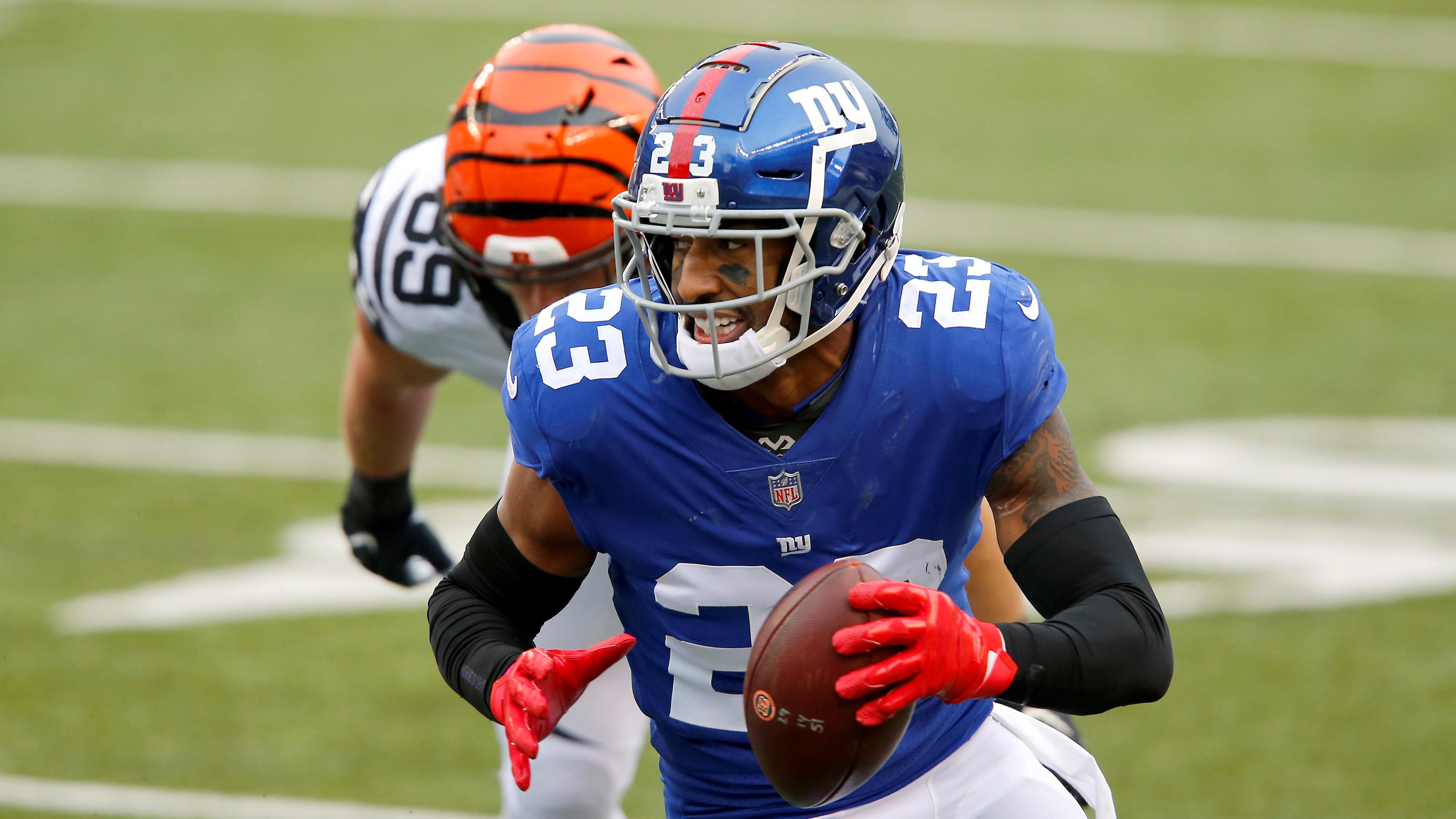 Nov 29, 2020; Cincinnati, Ohio, USA; New York Giants free safety Logan Ryan (23) runs with the ball after recovering the forced fumble during the fourth quarter against the Cincinnati Bengals at Paul Brown Stadium. Mandatory Credit: Joseph Maiorana-USA TODAY Sports / Joseph Maiorana-USA TODAY Sports