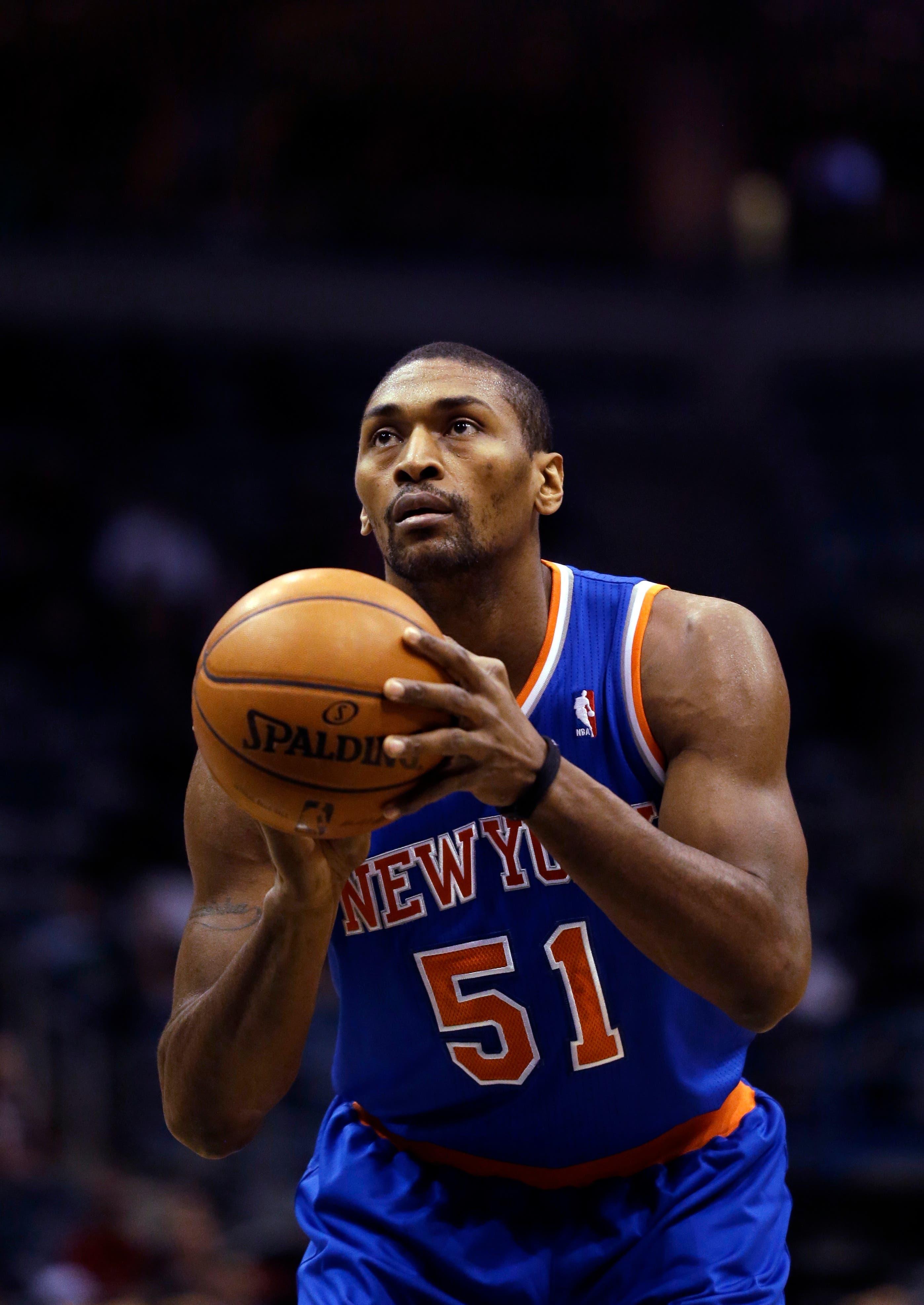 New York Knicks' Metta World Peace during the first half of an NBA basketball game against the Milwaukee Bucks Wednesday, Dec. 18, 2013, in Milwaukee. (AP Photo/Morry Gash) / Morry Gash/AP