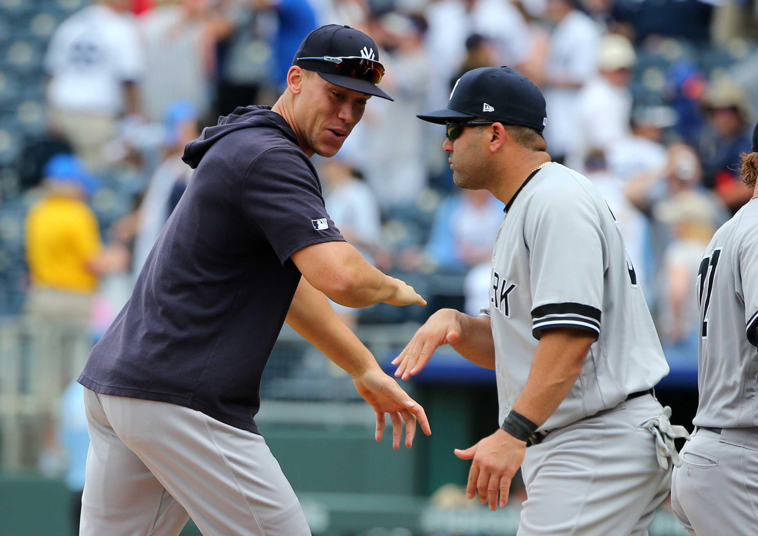 May 25, 2019; Kansas City, MO, USA; New York Yankees right fielder Aaron Judge (99) celebrates with designated hitter Kendrys MoralesÂ (36) after defeating the Kansas City Royals in the first game of a double header at Kauffman Stadium. Mandatory Credit: Jay Biggerstaff-USA TODAY Sports / Jay Biggerstaff