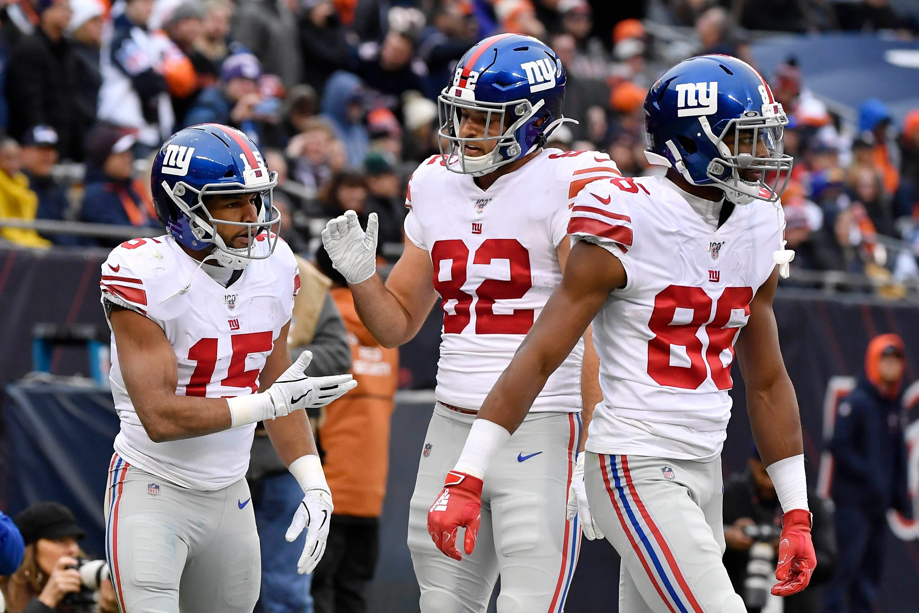 Nov 24, 2019; Chicago, IL, USA; New York Giants tight end Kaden Smith (82) congratulates New York Giants wide receiver Golden Tate (15) for his touchdown in the second half against the Chicago Bears at Soldier Field. Mandatory Credit: Quinn Harris-USA TODAY Sports / Quinn Harris