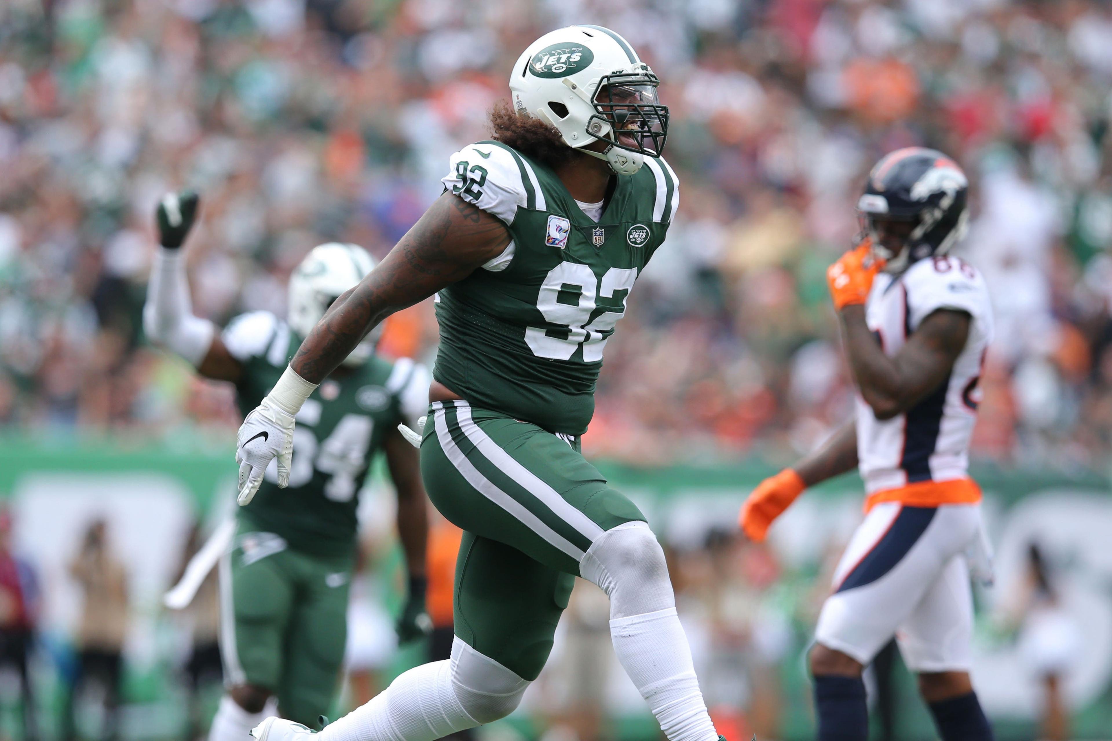 Oct 7, 2018; East Rutherford, NJ, USA; New York Jets defensive end Leonard Williams (92) celebrates a sack against the Denver Broncos during the second quarter at MetLife Stadium. Mandatory Credit: Brad Penner-USA TODAY Sports / Brad Penner