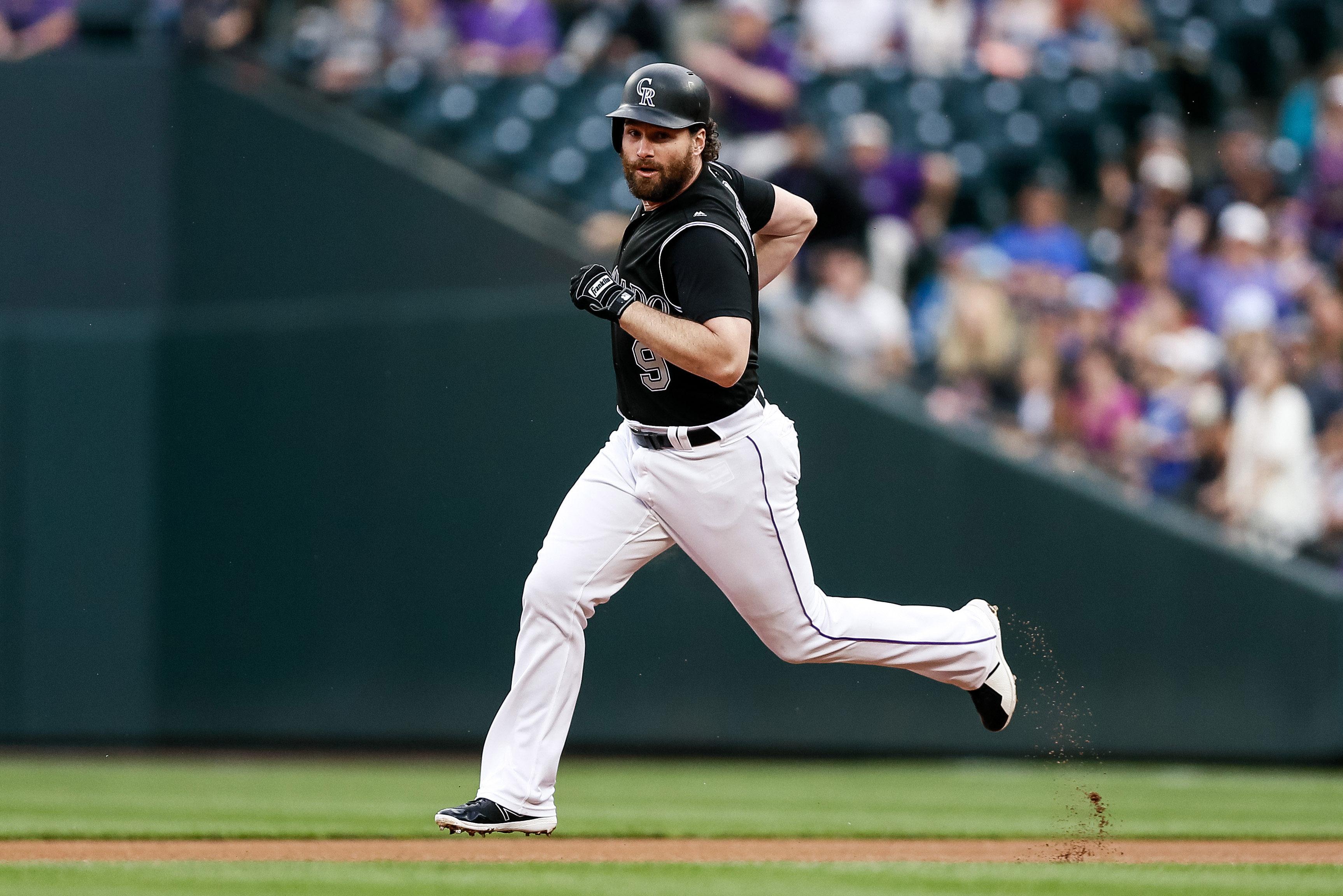 May 31, 2019; Denver, CO, USA; Colorado Rockies first baseman Daniel Murphy (9) runs to second on a two RBI double in the first inning against the Toronto Blue Jays at Coors Field. Mandatory Credit: Isaiah J. Downing-USA TODAY Sports