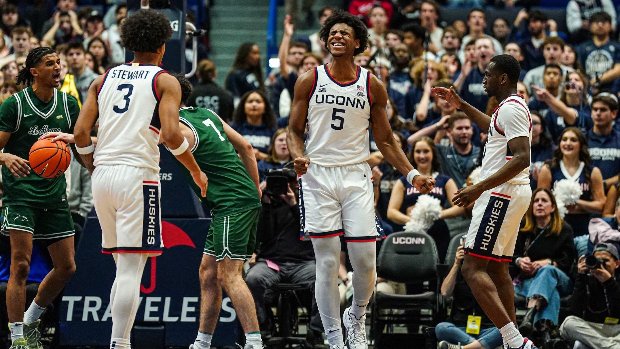 Nov 13, 2024; Storrs, Connecticut, USA; UConn Huskies center Tarris Reed Jr. (5) reacts after a play against the Le Moyne Dolphins in the first half at Harry A. Gampel Pavilion. / David Butler II-Imagn Images