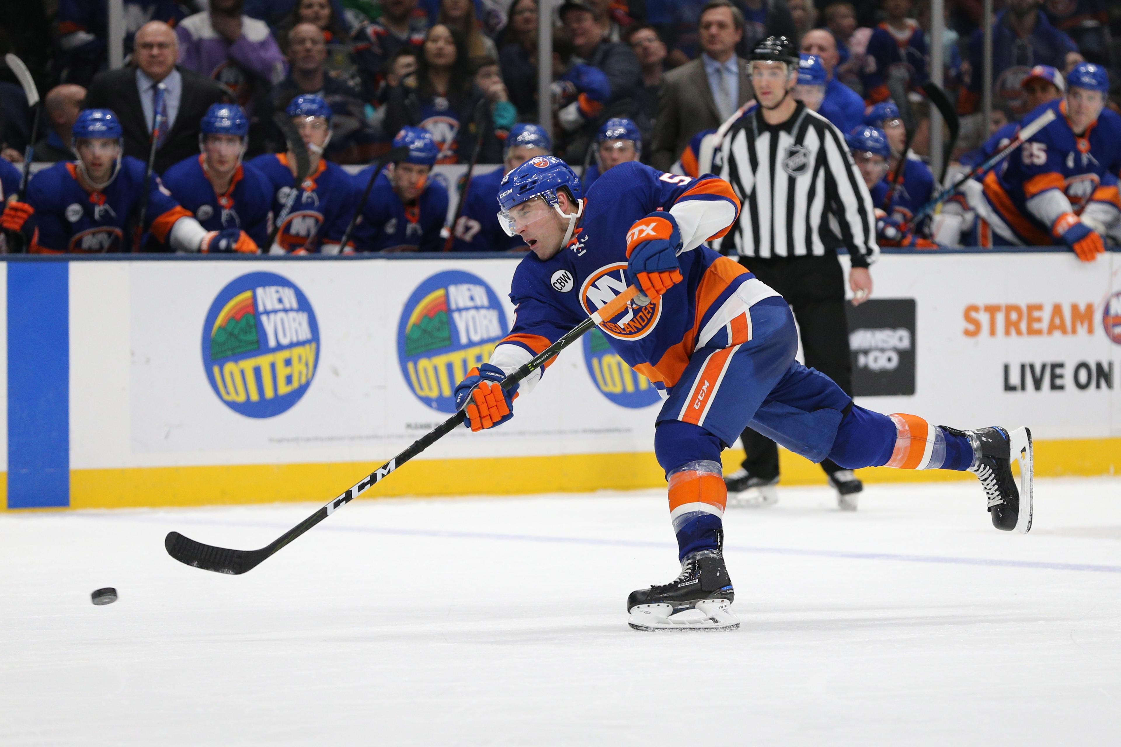 New York Islanders defenseman Johnny Boychuk shoots against the Arizona Coyotes during the second period at Nassau Veterans Memorial Coliseum.