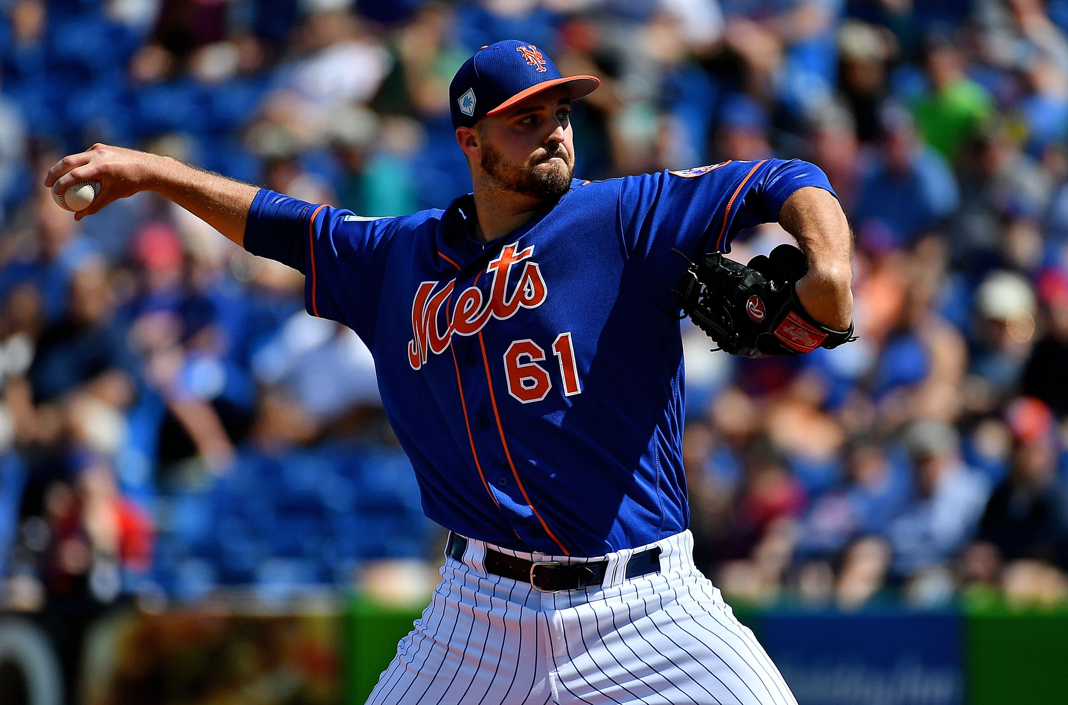 Feb 23, 2019; Port St. Lucie, FL, USA; New York Mets relief pitcher Walker Lockett (61) delivers a pitch in the first inning against the Atlanta Braves at First Data Field. Mandatory Credit: Jasen Vinlove-USA TODAY Sports / Jasen Vinlove