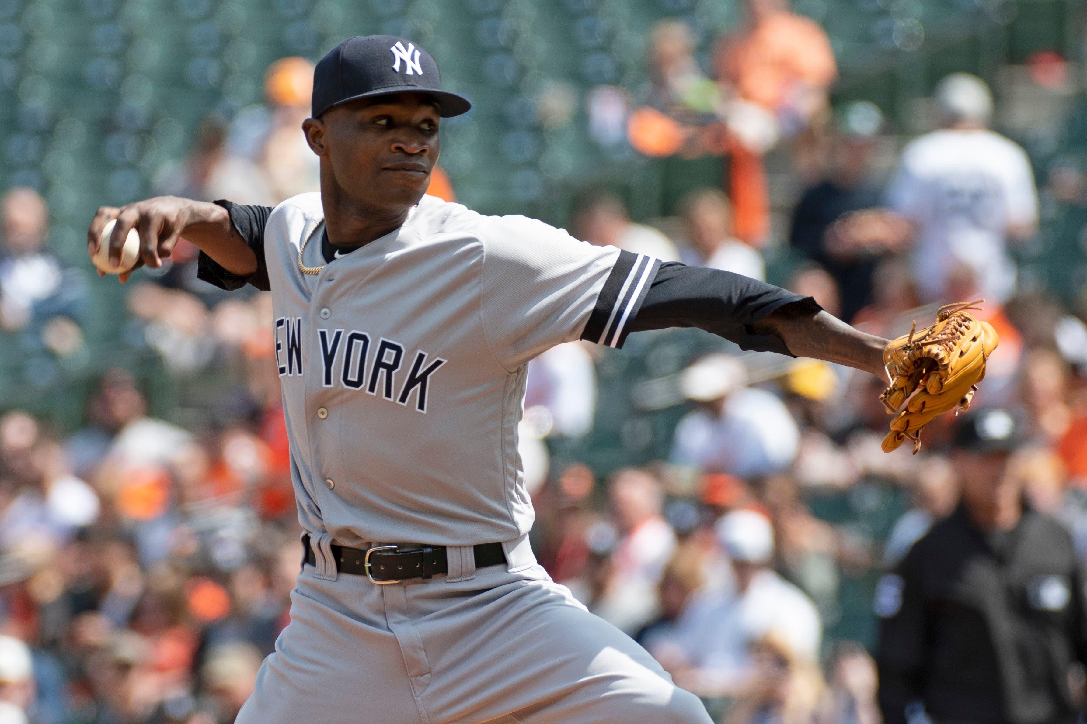 New York Yankees starting pitcher Domingo German delivers a pitch during the first inning against the Baltimore Orioles at Oriole Park at Camden Yards. / Tommy Gilligan/USA TODAY Sports