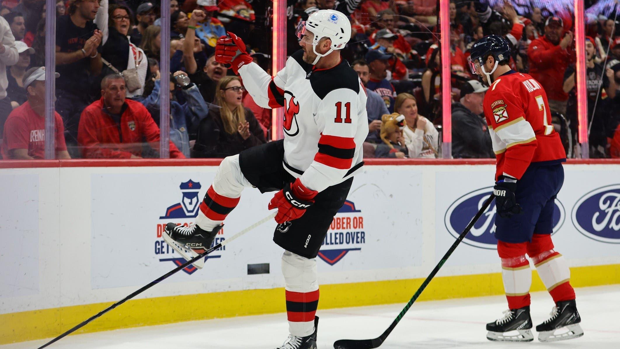 Nov 14, 2024; Sunrise, Florida, USA; New Jersey Devils right wing Stefan Noesen (11) celebrates after scoring against the Florida Panthers during the first period at Amerant Bank Arena. / Sam Navarro-Imagn Images