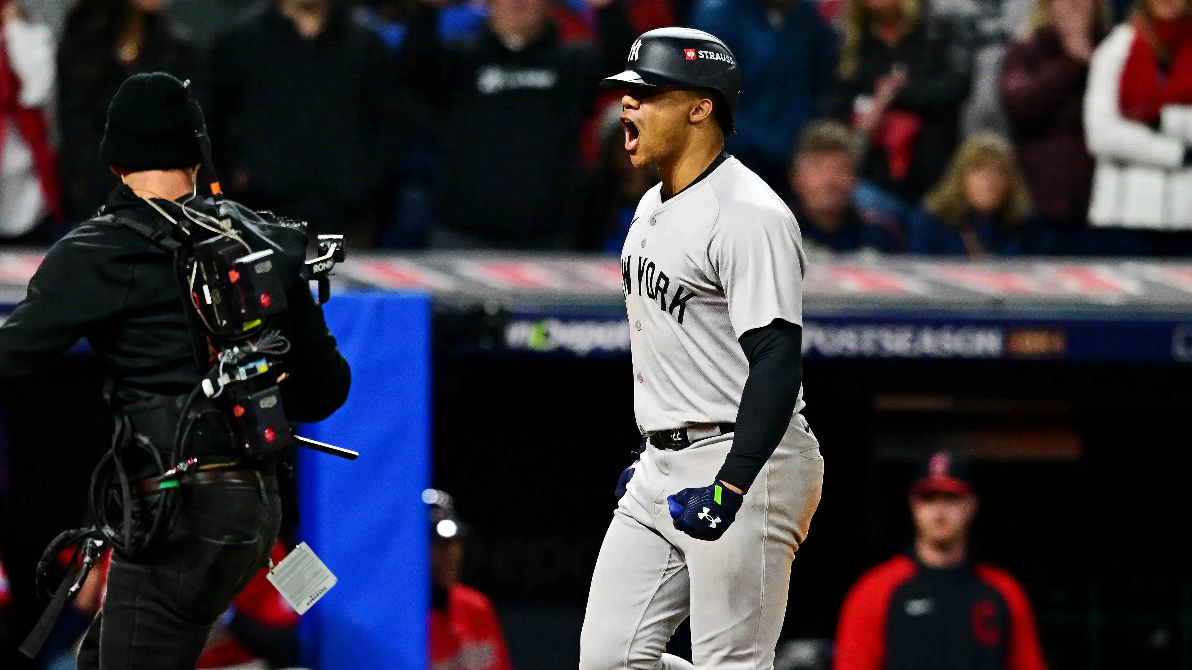 New York Yankees outfielder Juan Soto (22) crosses home plate after hitting a three run home run during the tenth inning against the Cleveland Guardians during game five of the ALCS for the 2024 MLB playoffs at Progressive Field / David Dermer - Imagn Images