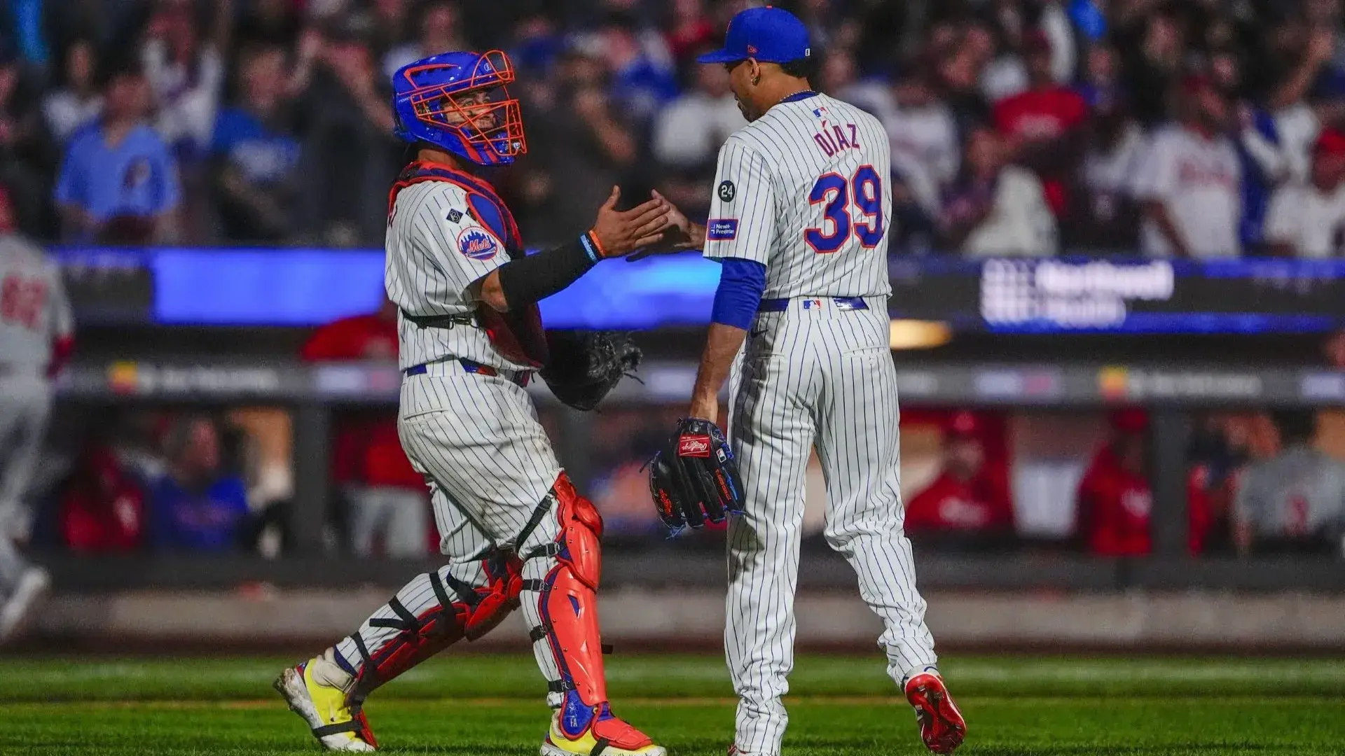 Sep 22, 2024; New York City, New York, USA; New York Mets catcher Francisco Alvarez (4) and New York Mets pitcher Edwin Diaz (39) shake hands after getting the final out of the game against the Philadelphia Phillies at Citi Field. / Gregory Fisher-Imagn Images