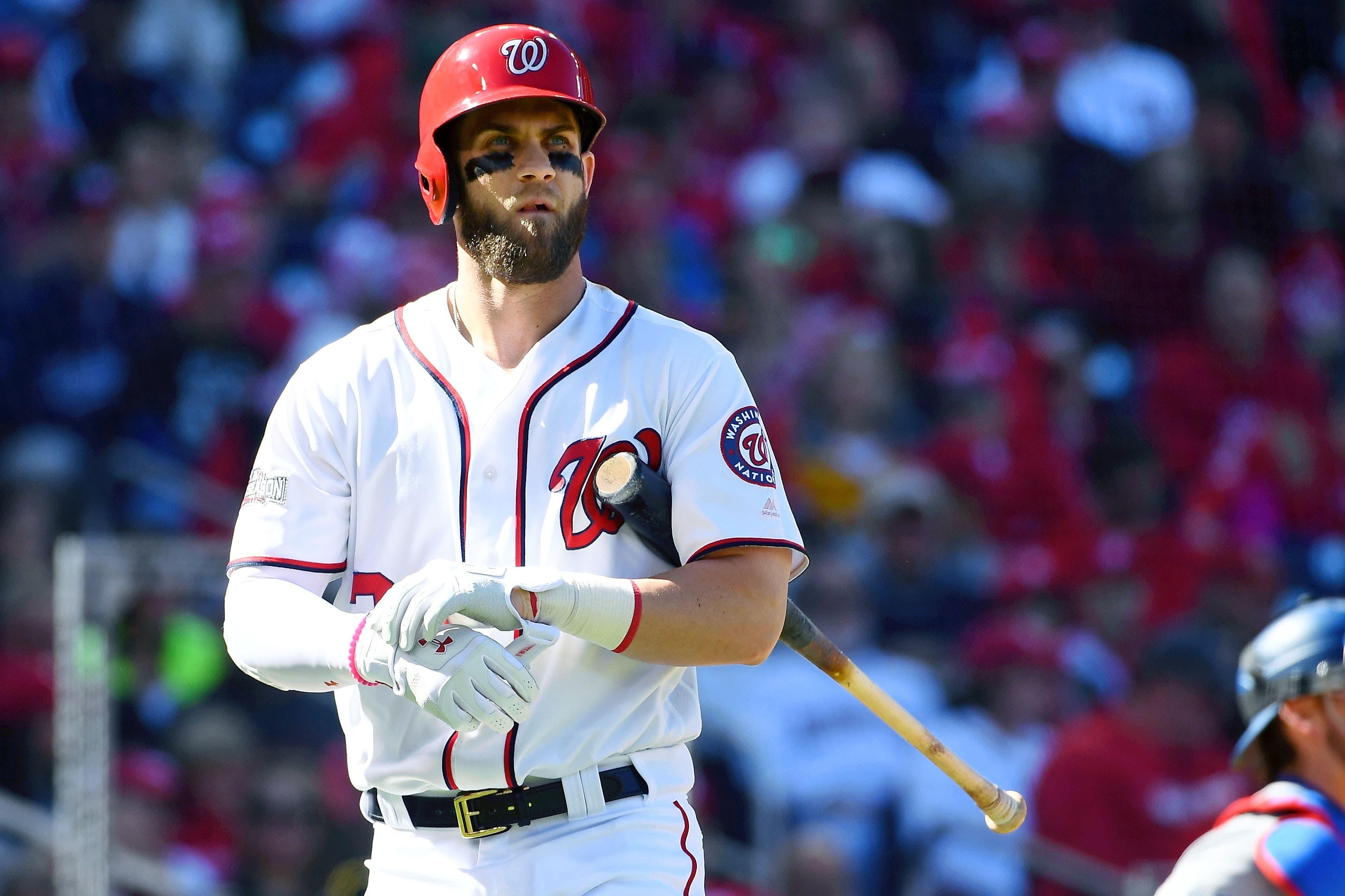 Washington Nationals right fielder Bryce Harper (34) reacts after striking out against the Los Angeles Dodgers during the third inning during game two of the 2016 NLDS playoff baseball series at Nationals Park. / Brad Mills