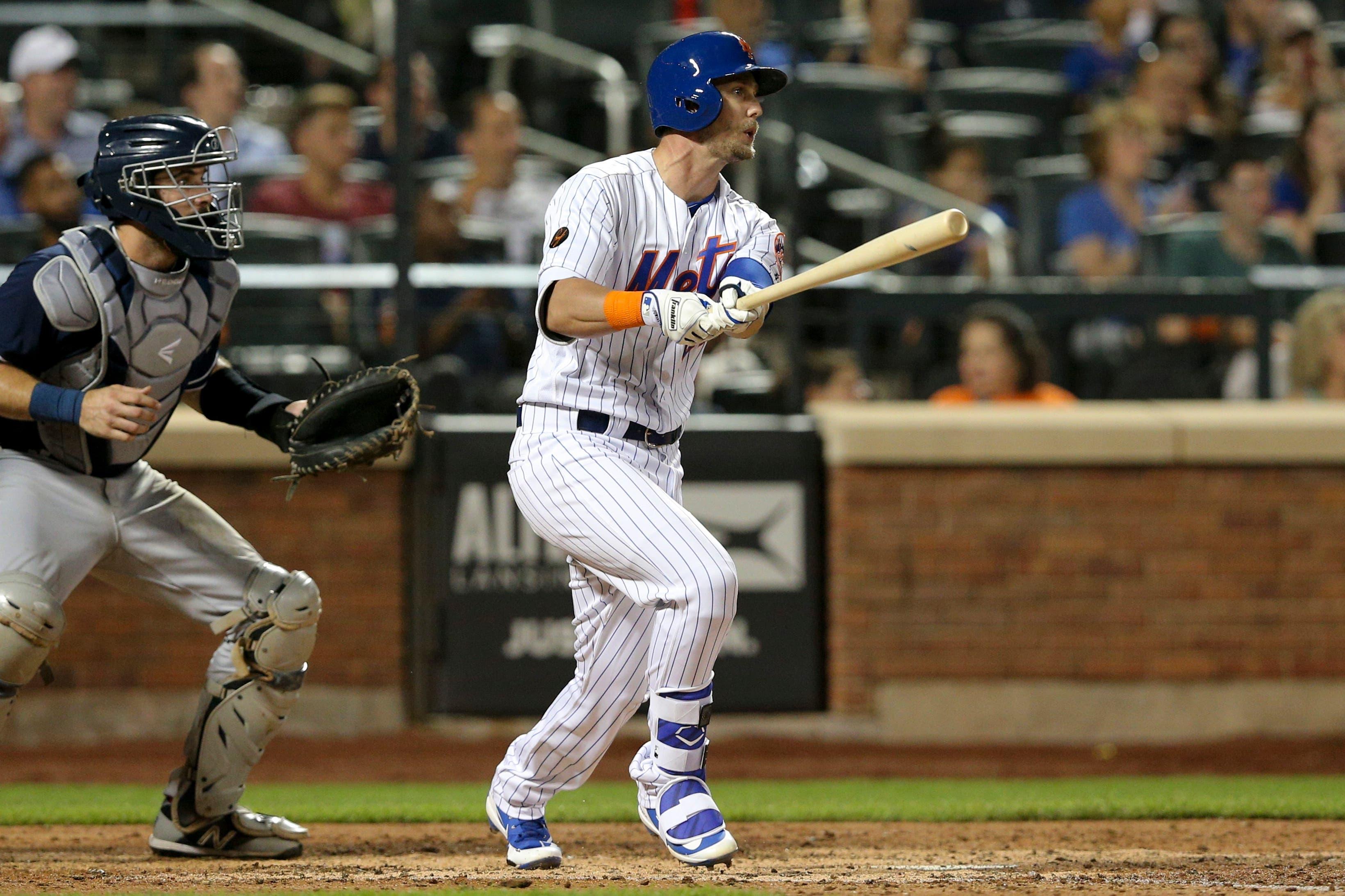 Jul 24, 2018; New York City, NY, USA; New York Mets pinch hitter Jeff McNeil (68) follows through on a single against the San Diego Padres during the ninth inning at Citi Field. The hit was his first major league hit. Mandatory Credit: Brad Penner-USA TODAY Sports / Brad Penner