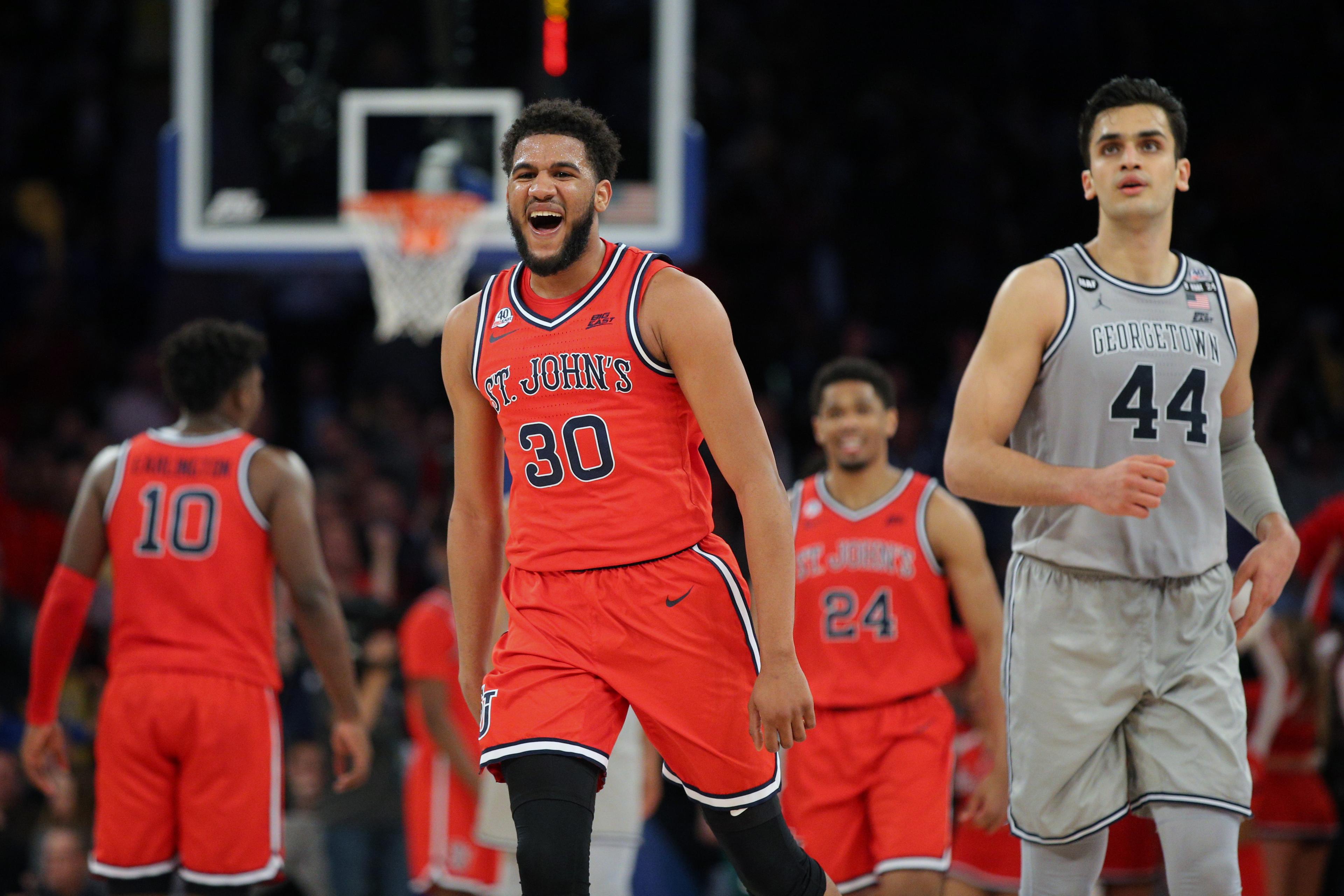 Mar 11, 2020; New York, New York, USA; St. John Red Storm guard LJ Figueroa (30) reacts after a three point shot against the Georgetown Hoyas during the second half in the Big East tournament at Madison Square Garden. Mandatory Credit: Brad Penner-USA TODAY Sports 