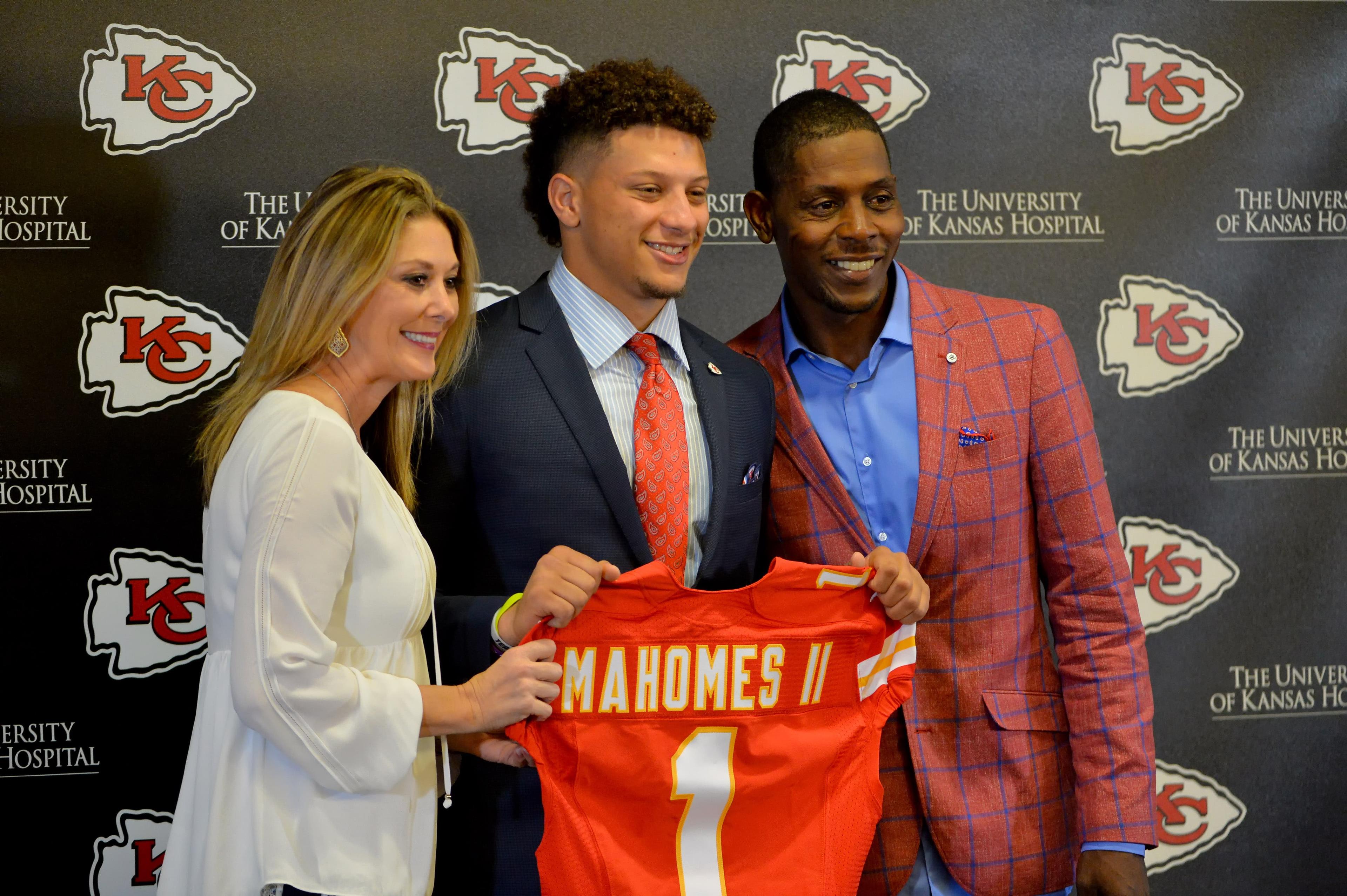 Apr 28, 2017; Kansas City, MO, USA; Kansas City Chiefs number 10 pick Patrick Mahomes II poses for a photo with his mother Randi and father Pat during the press conference at Stram Theatre. Mandatory Credit: Denny Medley-USA TODAY Sports / Denny Medley