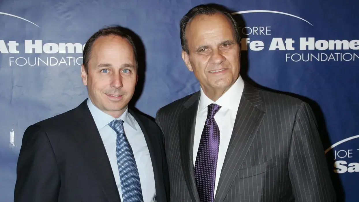 NEW YORK - NOVEMBER 11: NY Yankees General Manager Brian Cashman and Joe Torre attend the 8th annual Joe Torre Safe at Home Foundation gala at Pier Sixty at Chelsea Piers on November 11, 2010 in New York City. / Photo by Jim Spellman/WireImage via Getty Images