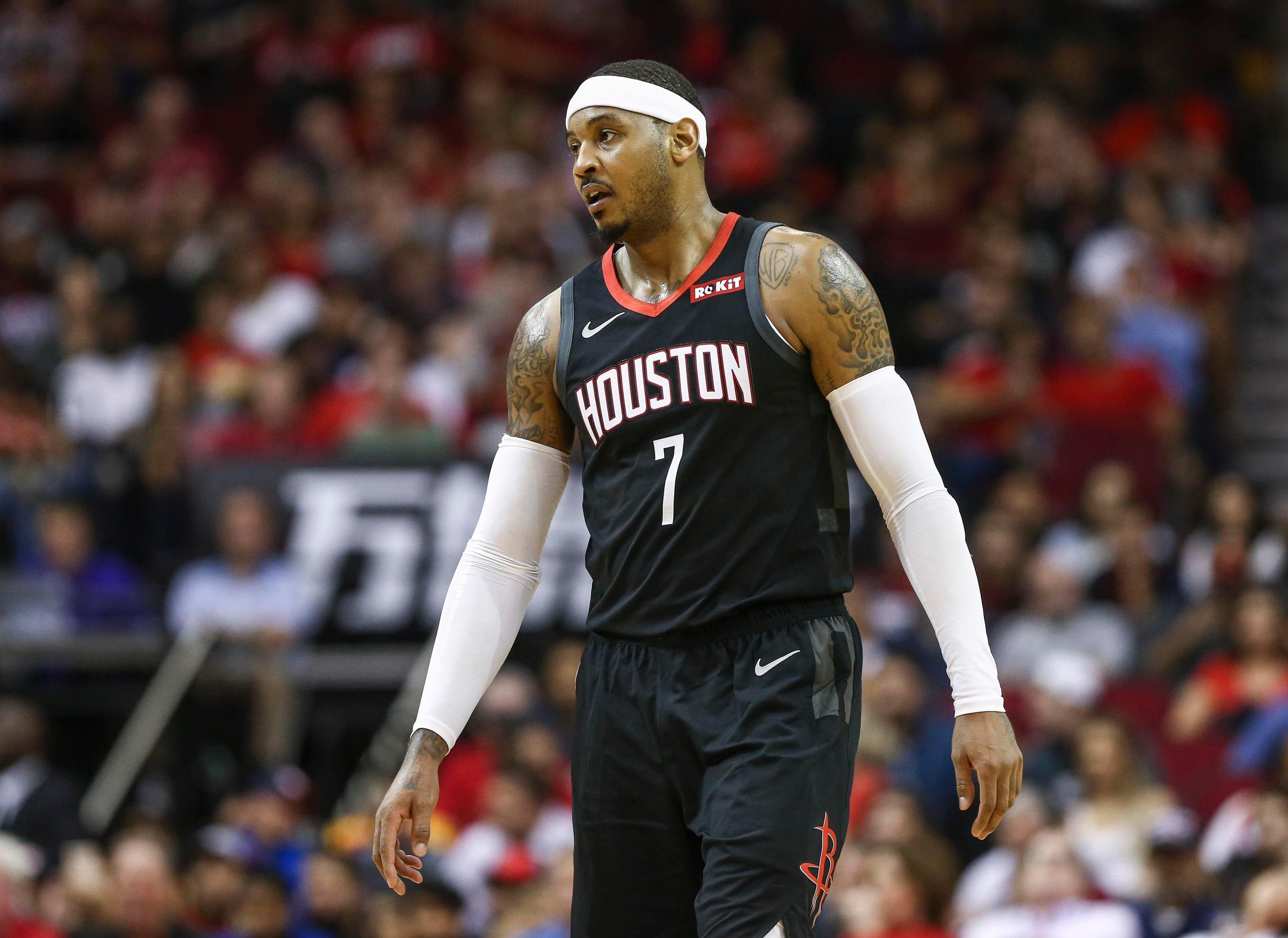 Houston Rockets forward Carmelo Anthony reacts after a play during the second half against the Portland Trail Blazers at Toyota Center. / Troy Taormina/USA TODAY Sports