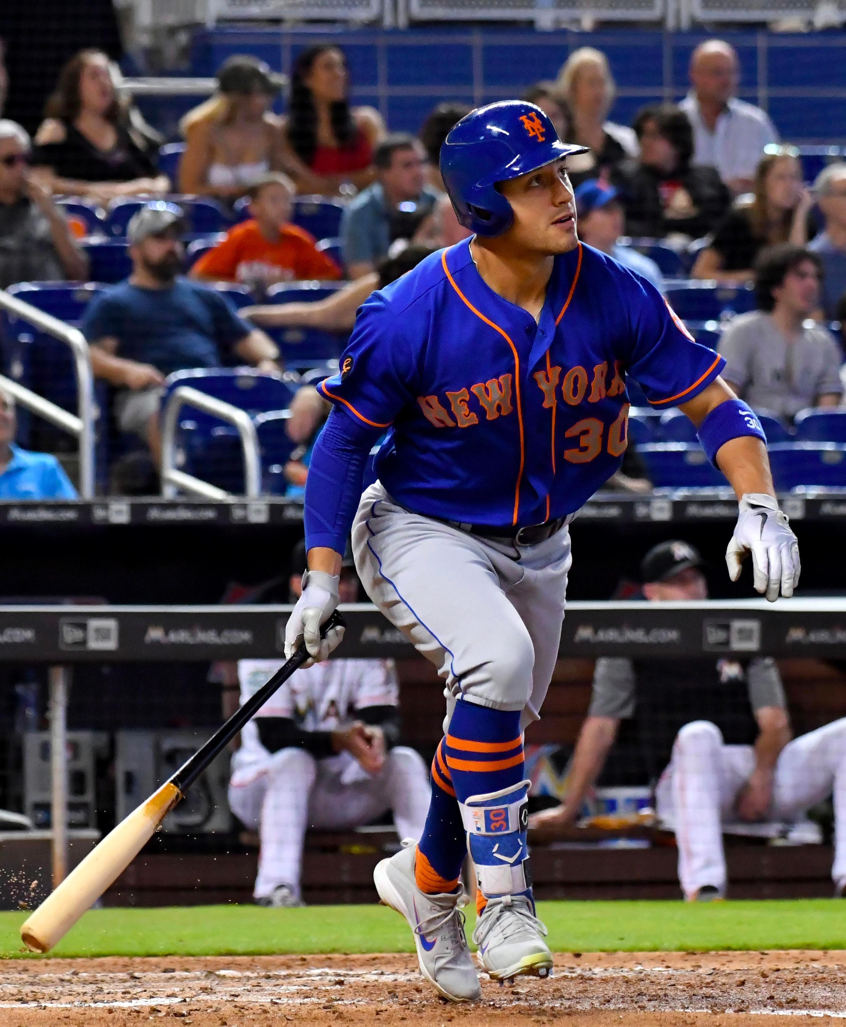 Aug 12, 2018; Miami, FL, USA; New York Mets left fielder Michael Conforto (30) watches a he hits a solo home run in the sixth inning against the Miami Marlins at Marlins Park. Mandatory Credit: Steve Mitchell-USA TODAY Sports