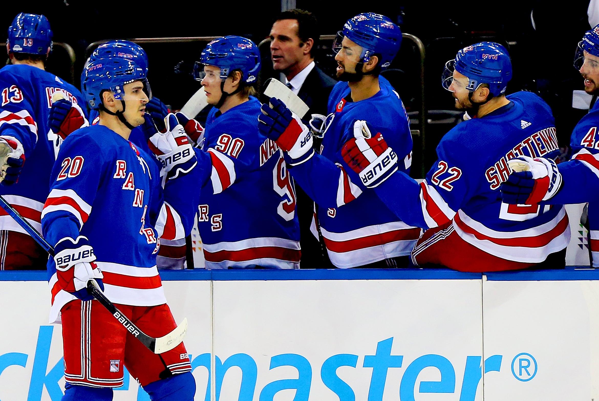 New York Rangers left wing Chris Kreider is congratulated after scoring a goal against the Los Angeles Kings during the first period at Madison Square Garden.