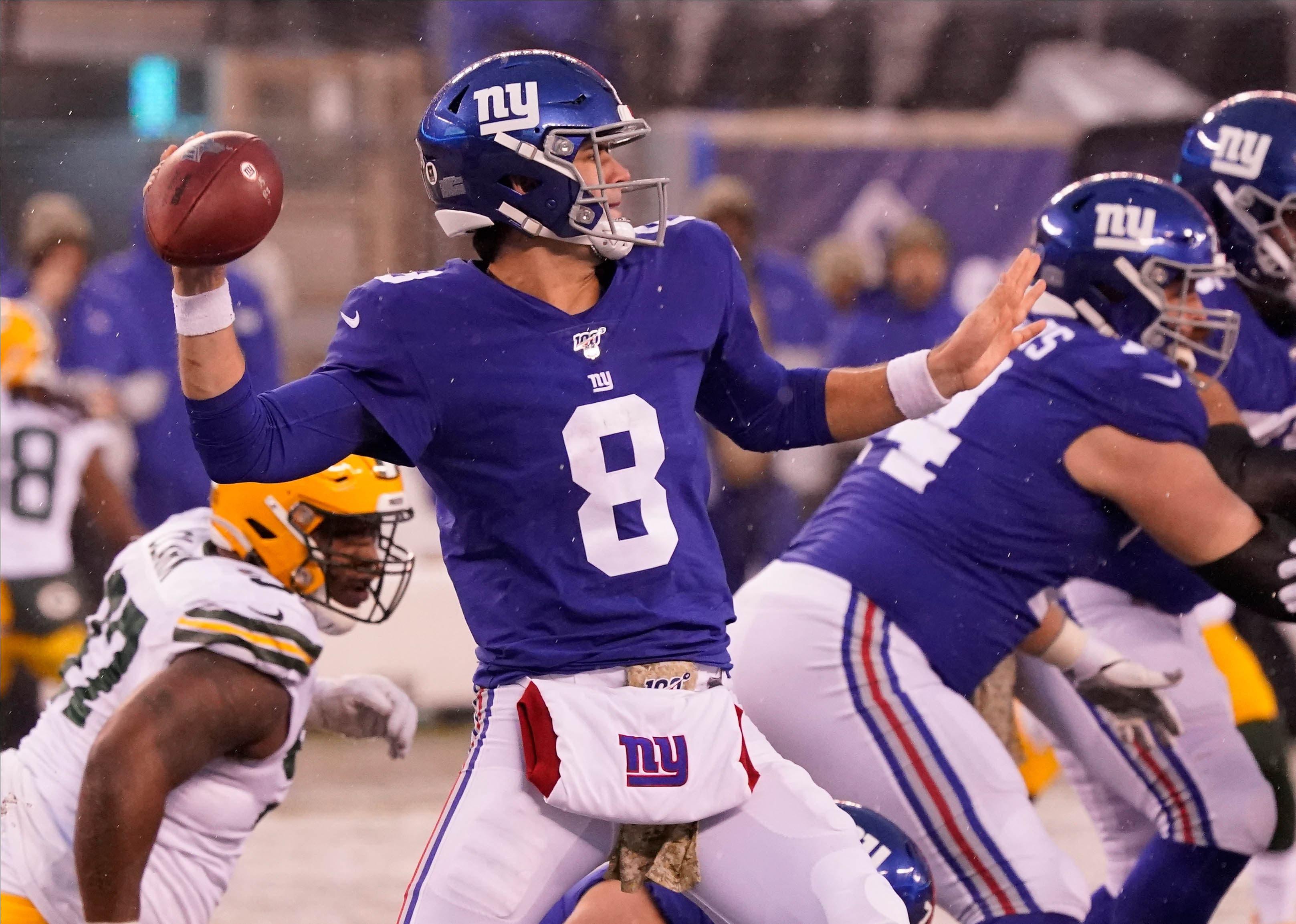 Dec 1, 2019; East Rutherford, NJ, USA; 
New York Giants quarterback Daniel Jones (8) throws in the 4th quarter against the Packers at MetLife Stadium. Mandatory Credit: Robert Deutsch-USA TODAY Sports / Robert Deutsch