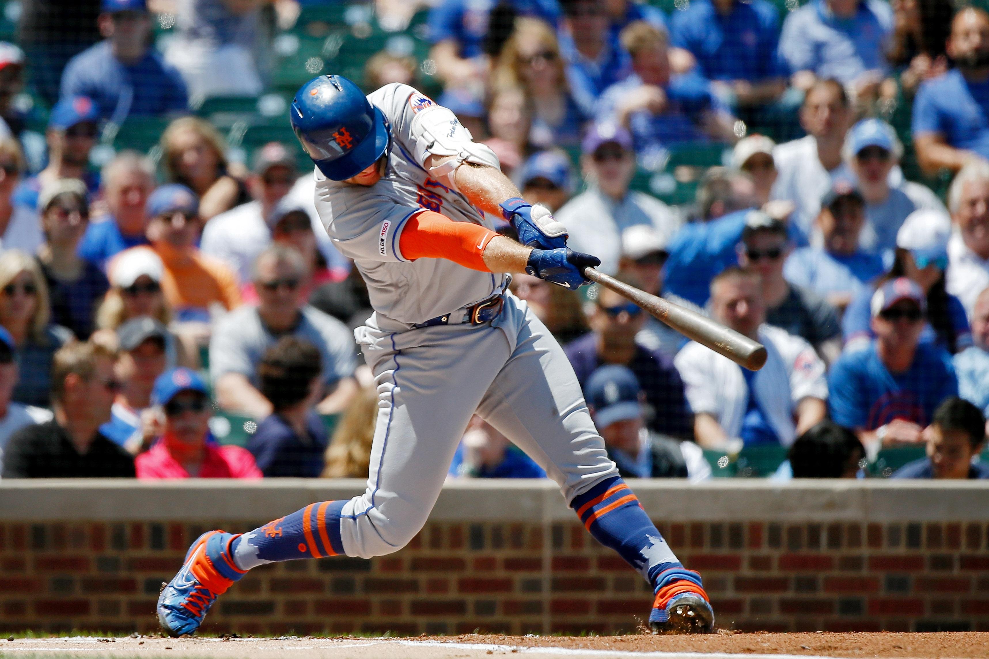 Jun 22, 2019; Chicago, IL, USA; New York Mets first baseman Pete Alonso (20) hits a home run against the Chicago Cubs during the first inning at Wrigley Field. Mandatory Credit: Jon Durr-USA TODAY Sports