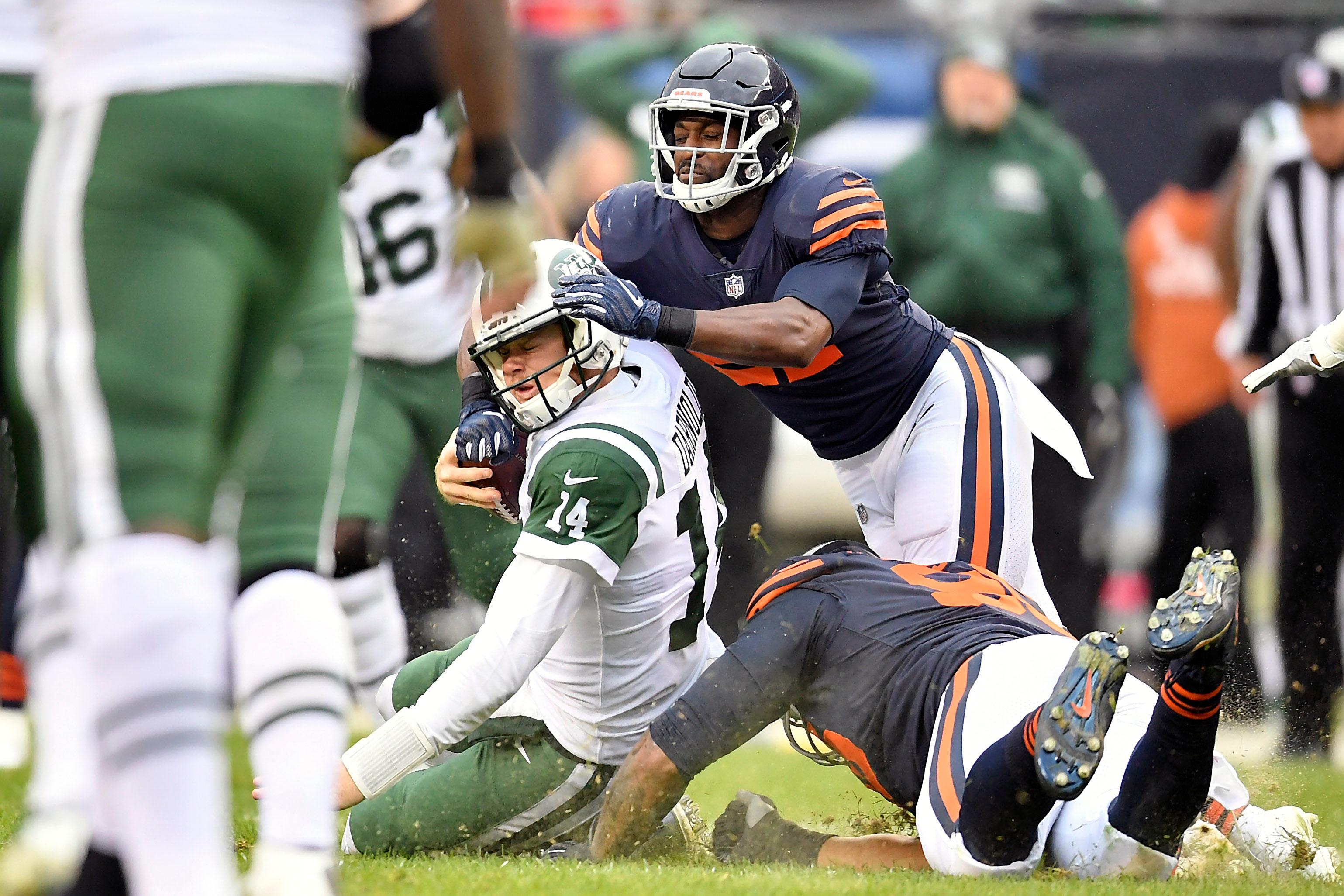 Oct 28, 2018; Chicago, IL, USA; New York Jets quarterback Sam Darnold (14) is tackled by Chicago Bears defensive back Sherrick McManis (27) at Soldier Field. Mandatory Credit: Quinn Harris-USA TODAY Sports