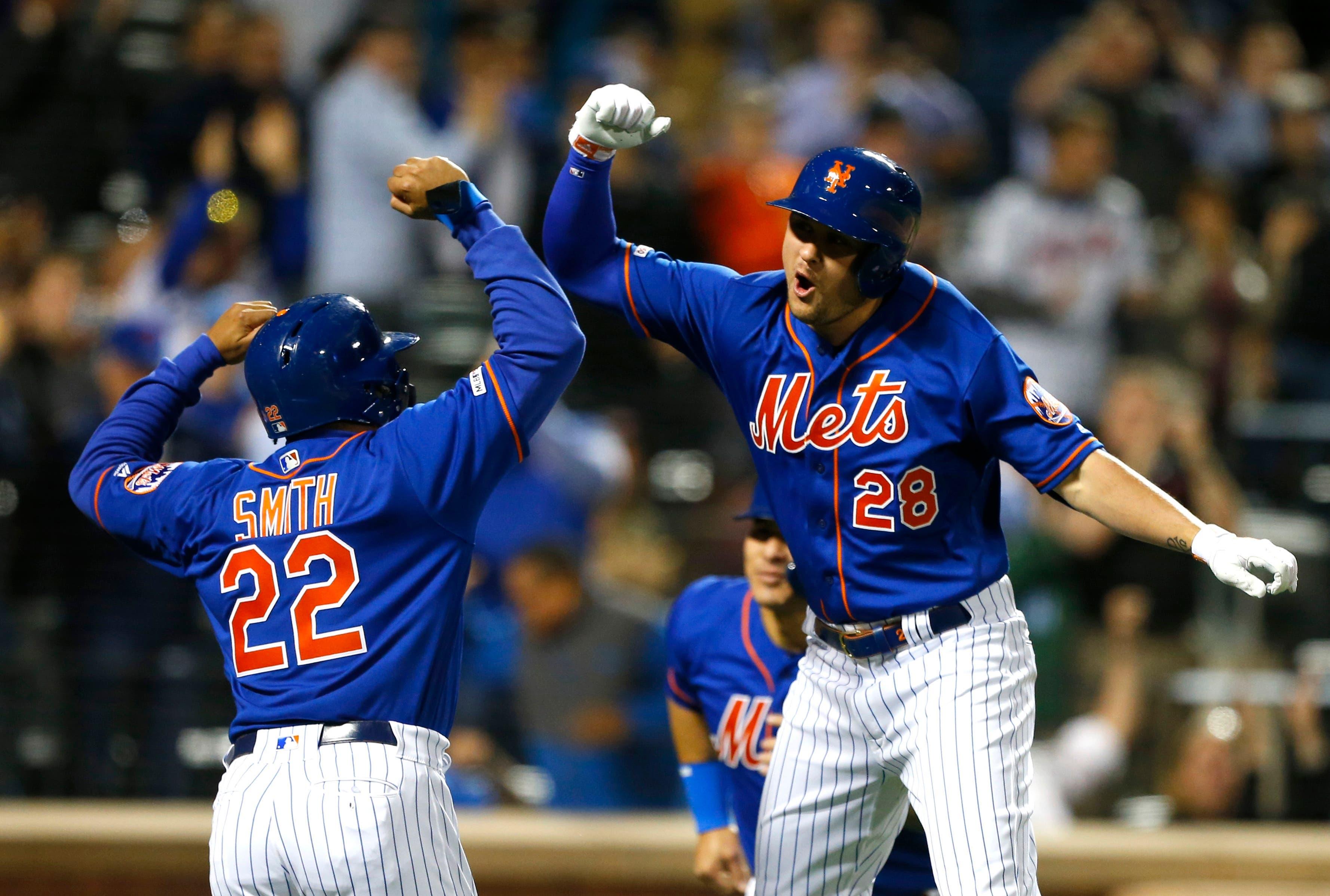 May 21, 2019; New York City, NY, USA; New York Mets third baseman J.D. Davis (28) celebrates with Dominic Smith (22) after hitting a home run in the seventh inning against the Washington Nationals at Citi Field. Mandatory Credit: Noah K. Murray-USA TODAY Sports / Noah K. Murray