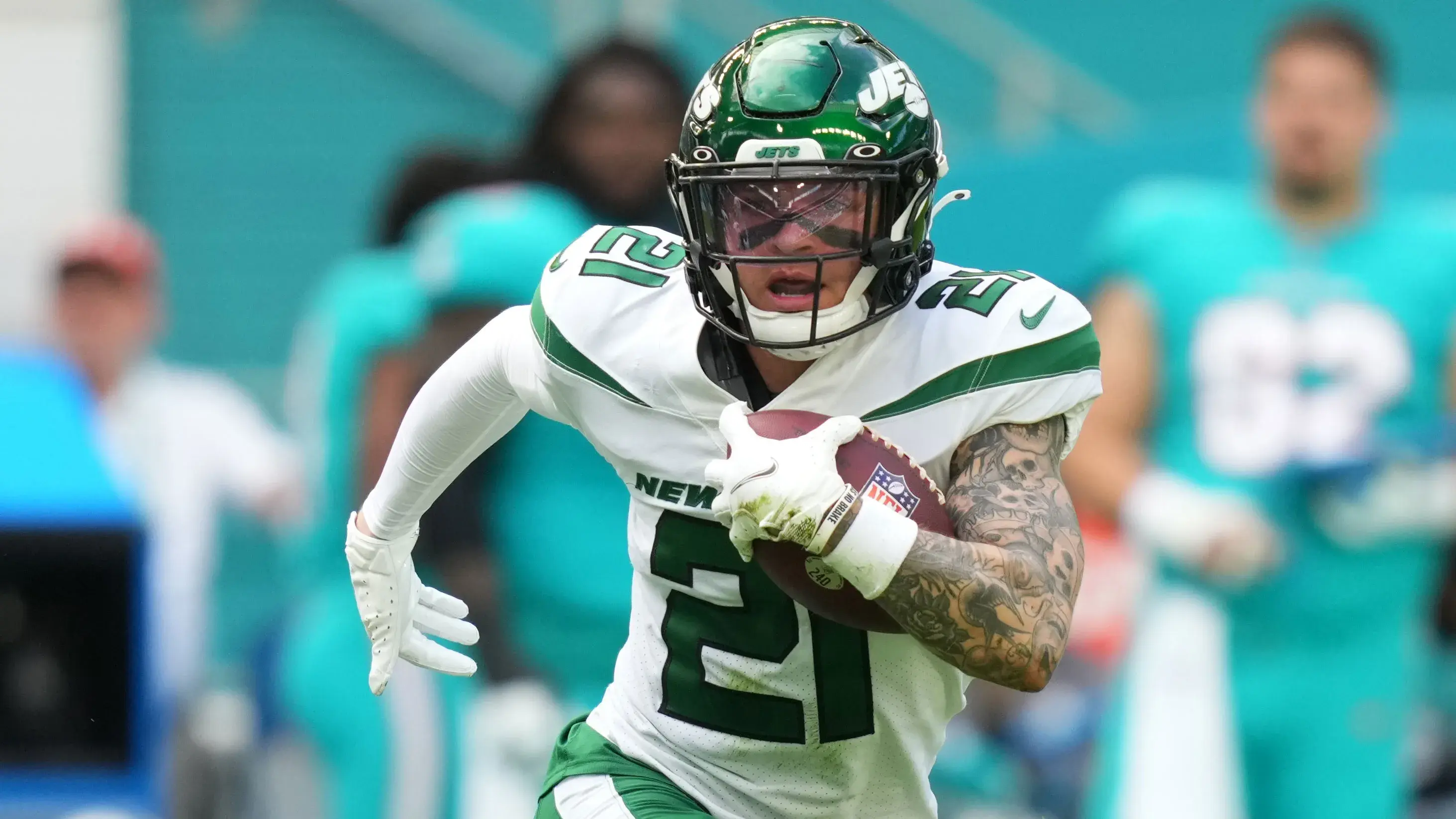 Dec 19, 2021; Miami Gardens, Florida, USA; New York Jets safety Ashtyn Davis (21) runs with the ball after intercepting a pass from Miami Dolphins quarterback Tua Tagovailoa (not pictured) during the first half at Hard Rock Stadium. / Jasen Vinlove-USA TODAY Sports