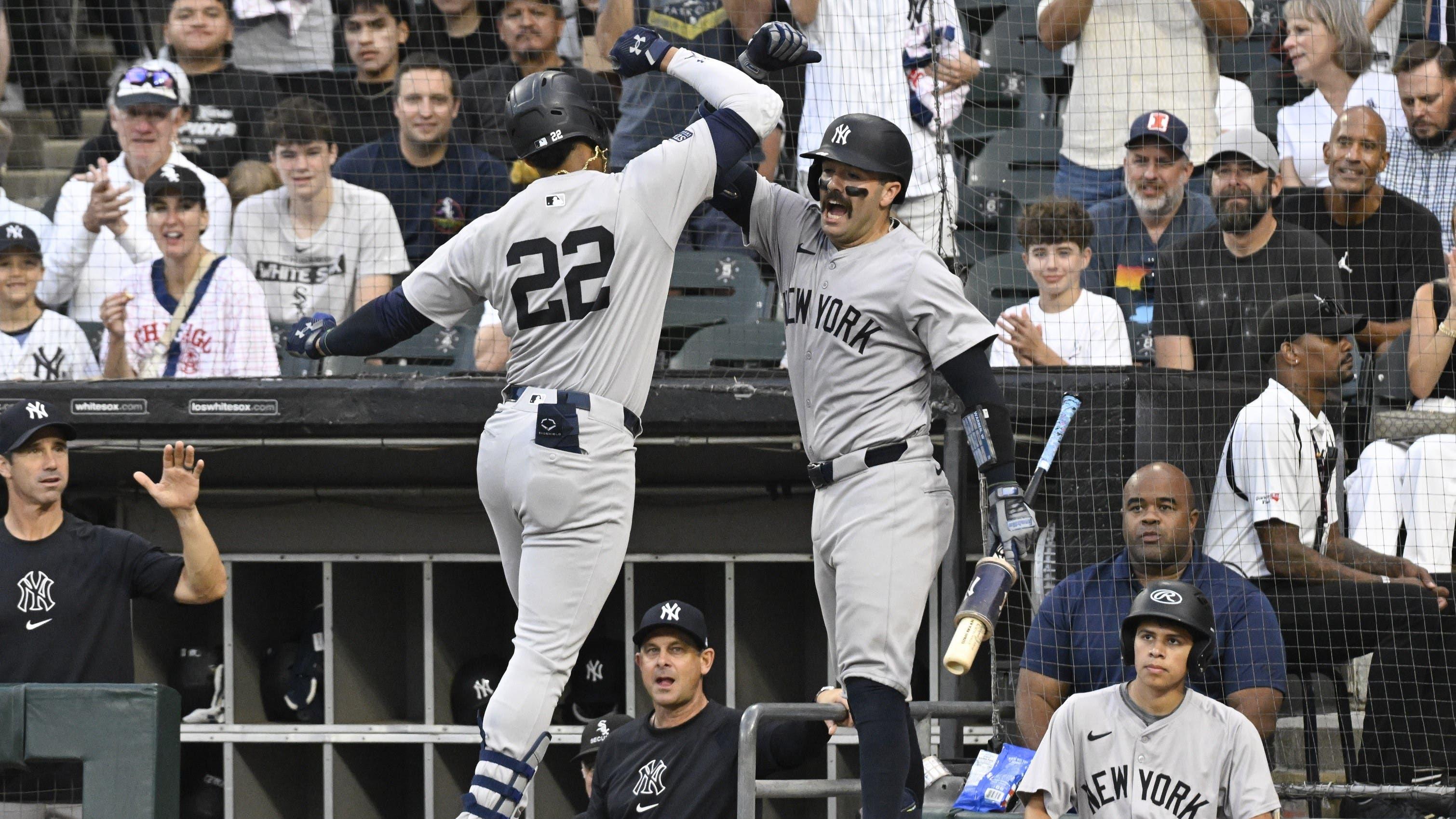 Aug 14, 2024; Chicago, Illinois, USA; New York Yankees outfielder Juan Soto (22) celebrates with catcher Austin Wells (28) after he hit a home run against the Chicago White Sox during the first inning at Guaranteed Rate Field. / Matt Marton-USA TODAY Sports