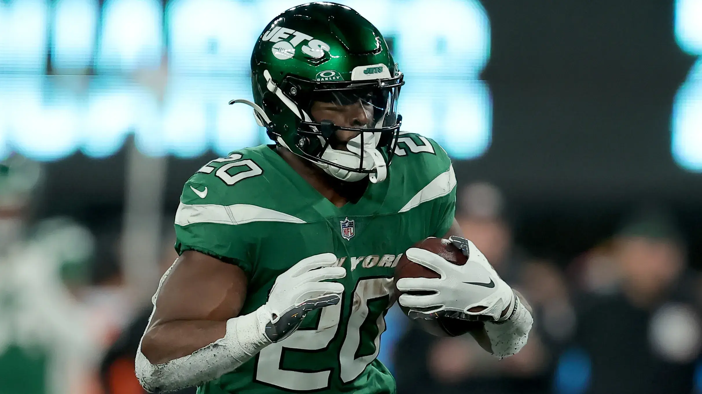 Oct 15, 2023; East Rutherford, New Jersey, USA; New York Jets running back Breece Hall (20) runs with the ball against the Philadelphia Eagles during the third quarter at MetLife Stadium. Mandatory Credit: Brad Penner-USA TODAY Sports / © Brad Penner-USA TODAY Sports