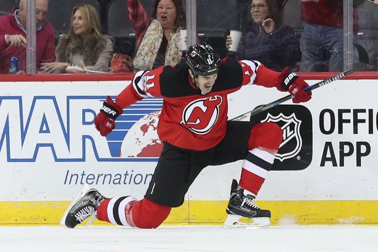 Nov 9, 2017; Newark, NJ, USA; New Jersey Devils center Brian Boyle (11) celebrates after scoring a goal during the first period against the Edmonton Oilers at Prudential Center. Mandatory Credit: Ed Mulholland-USA TODAY Sports / Ed Mulholland