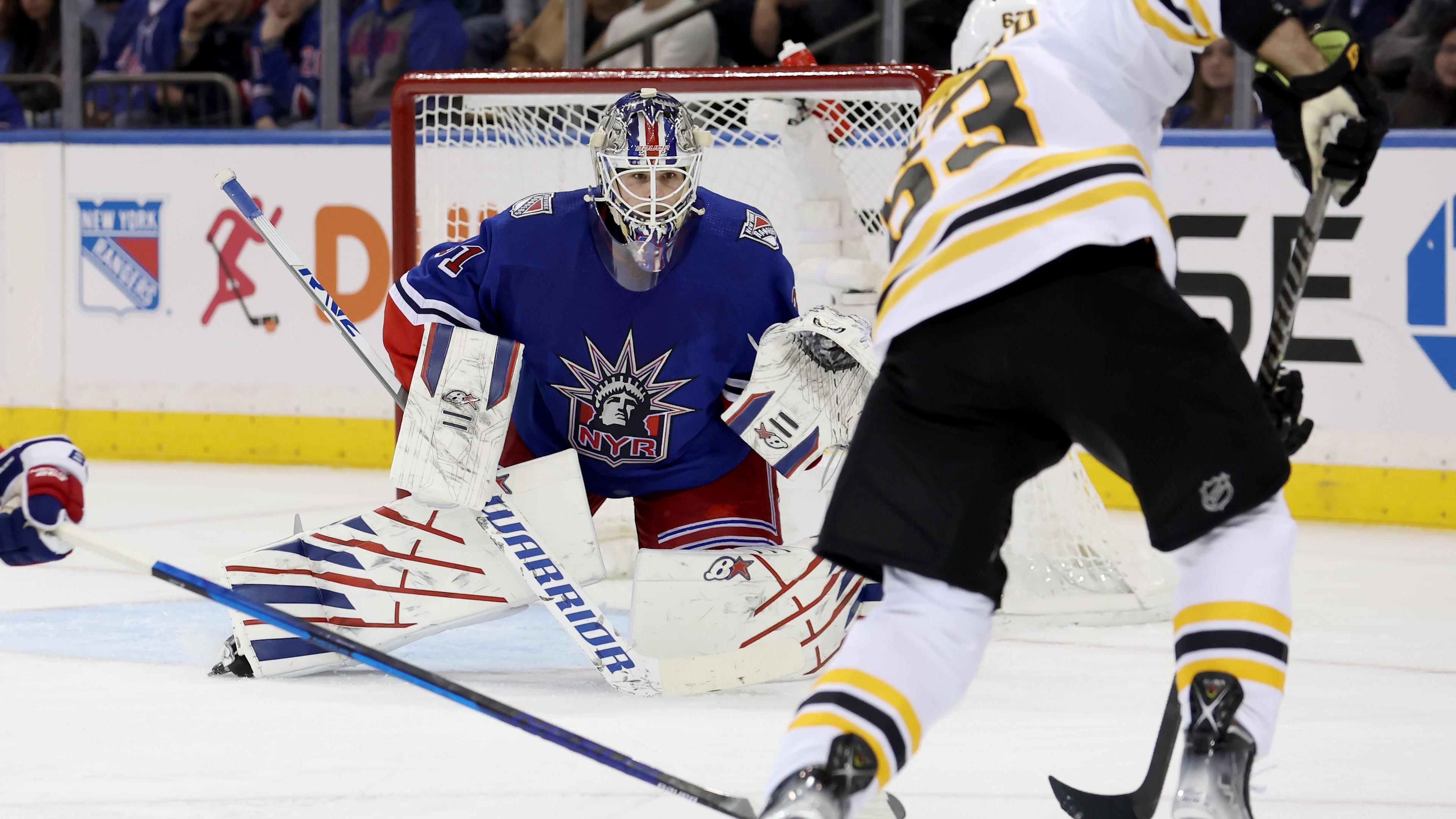 New York Rangers goaltender Igor Shesterkin (31) protects the net against Boston Bruins left wing Brad Marchand (63) during the second period at Madison Square Garden