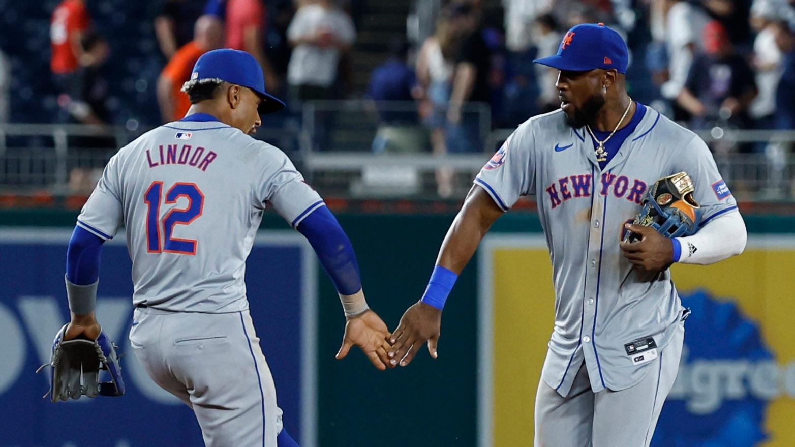 Jun 3, 2024; Washington, District of Columbia, USA; New York Mets shortstop Francisco Lindor (12) and Mets outfielder Starling Marte (6) celebrate after their game against the Washington Nationals at Nationals Park. / Geoff Burke - USA TODAY Sports